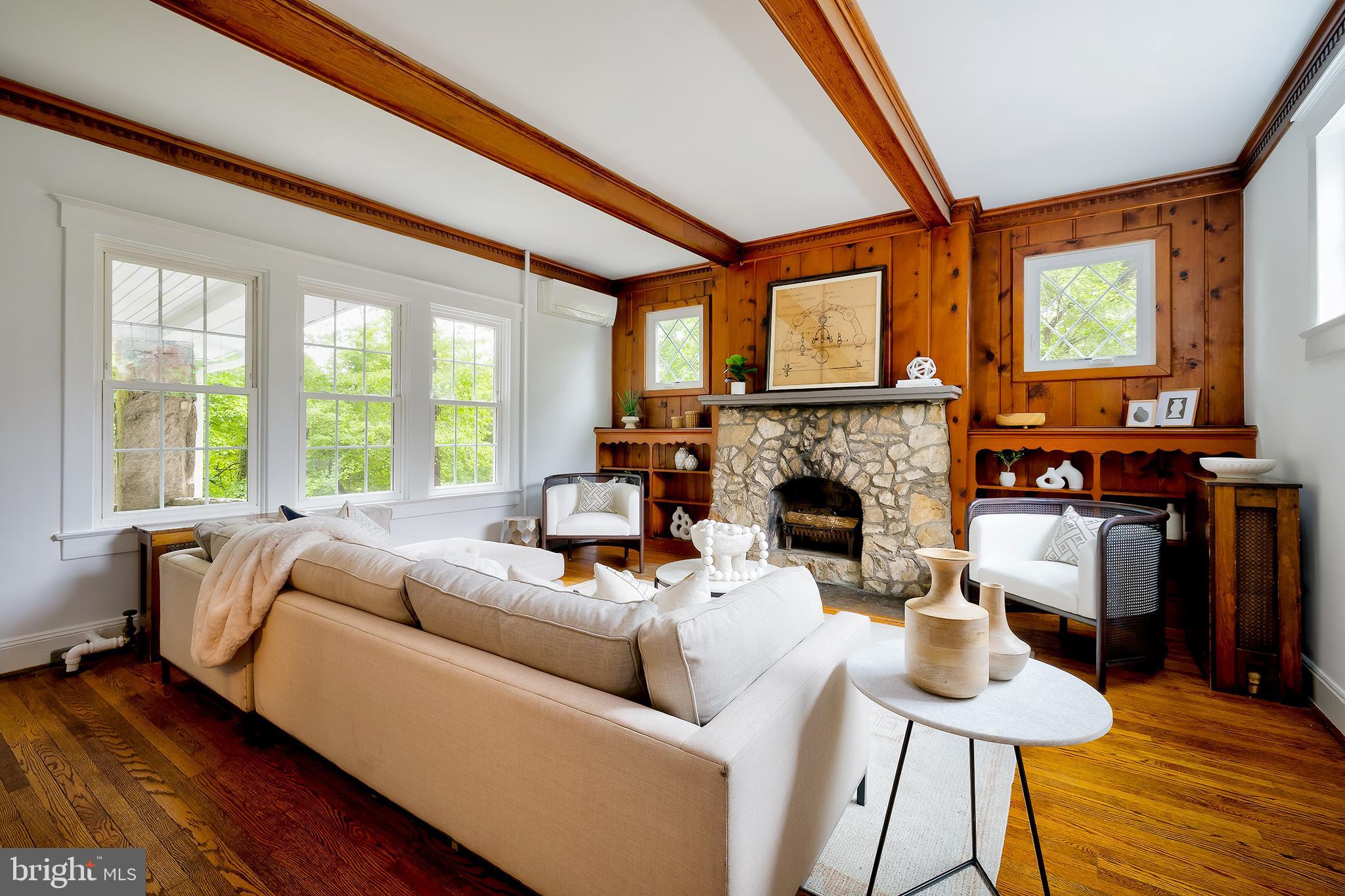 2925 Covington Road Silver Spring, MD 20910 - Photo 7 of 70 a living room with furniture and a fireplace