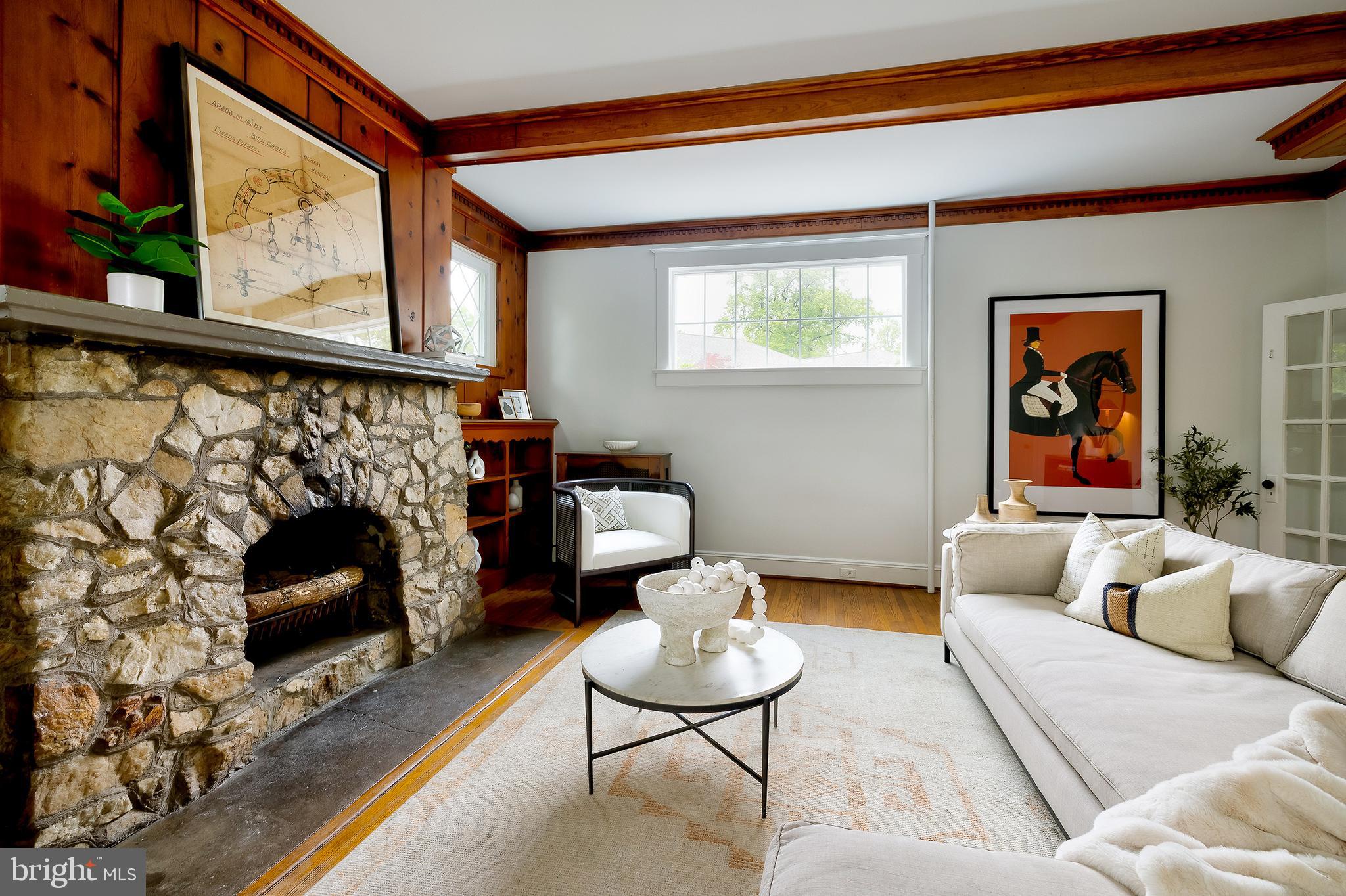 2925 Covington Road Silver Spring, MD 20910 - Photo 9 of 70 a living room with furniture and a fireplace