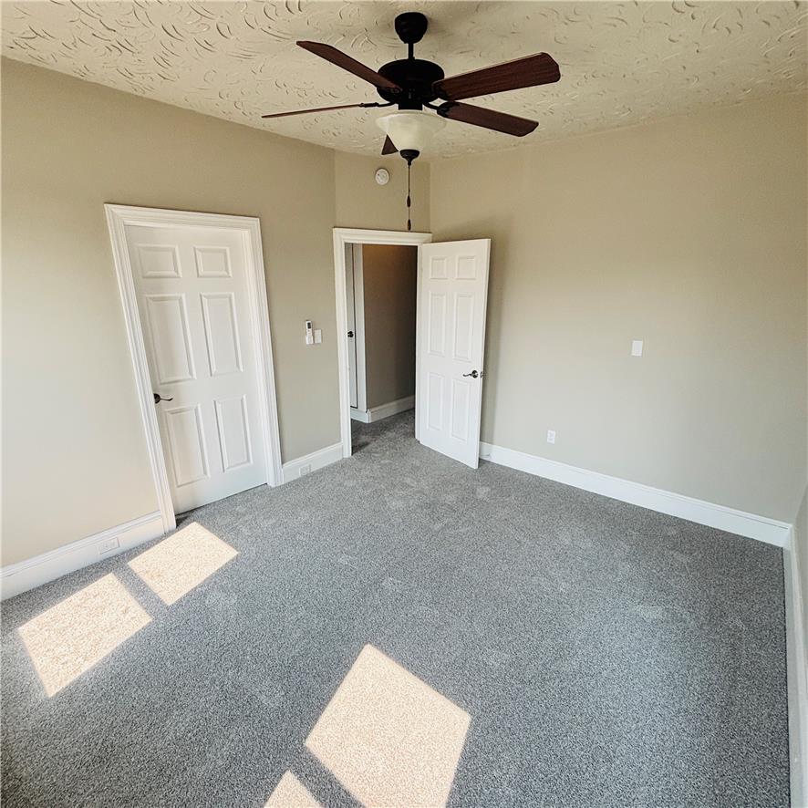 718 Linden Street Bethlehem, PA 18018 - Photo 4 of 19 An inviting sleeping space with neutral tones offers comfort and a tranquil atmosphere.