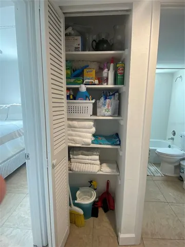 a bathroom with a toilet and a sink