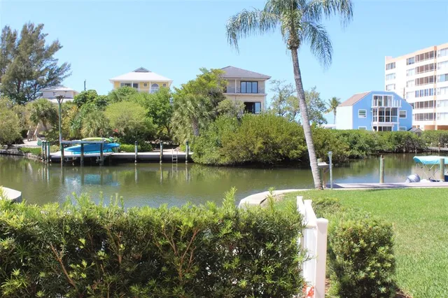 a view of a lake with a building in the background