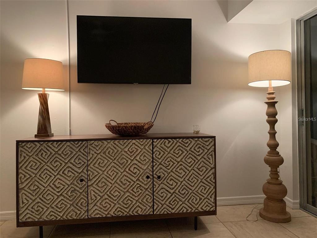 9200 Midnight Pass Road, Unit 10 Sarasota, FL 34242 - Photo 7 of 26 a bathroom with a sink and a mirror