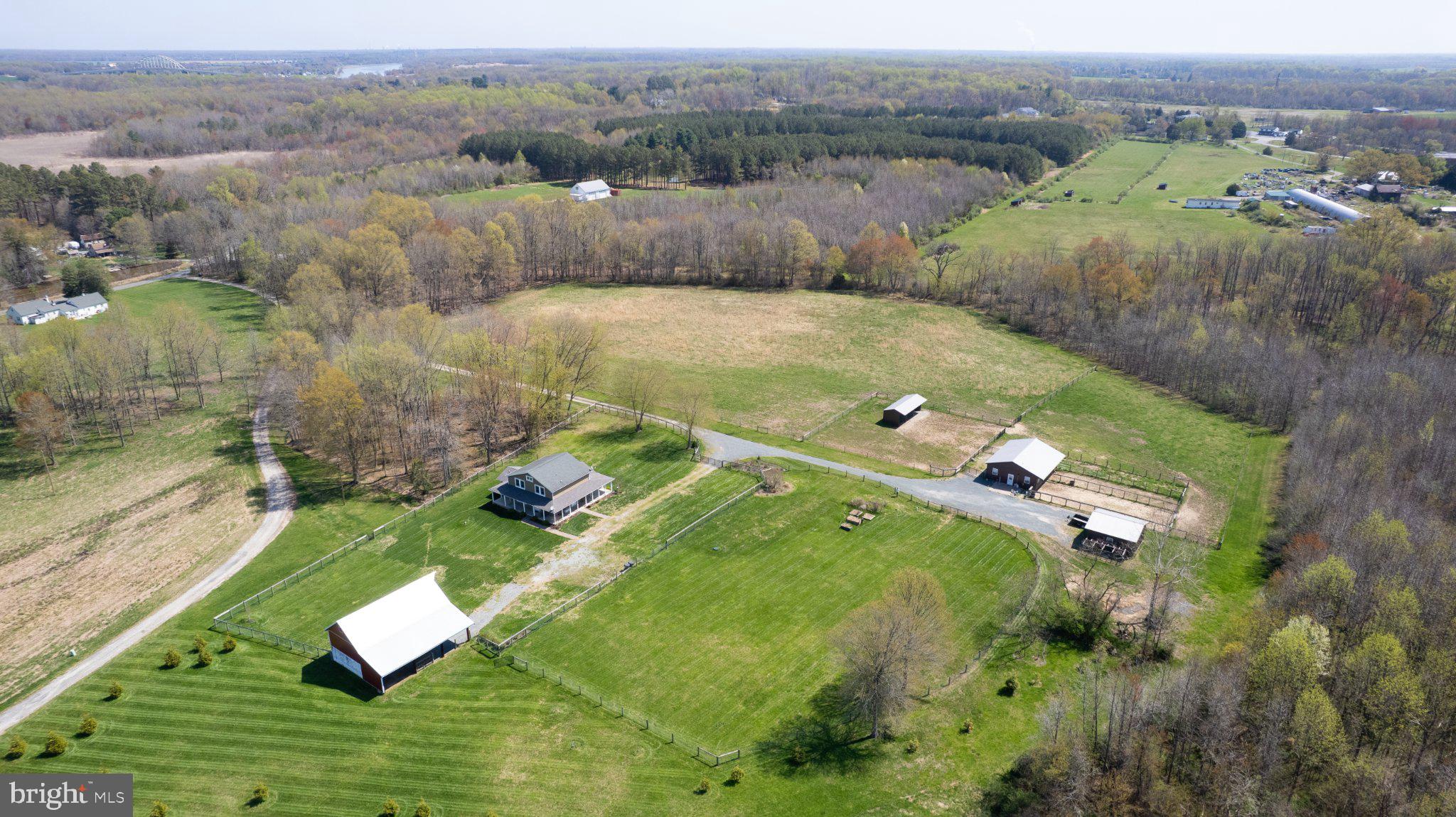 an aerial view of a house with a garden