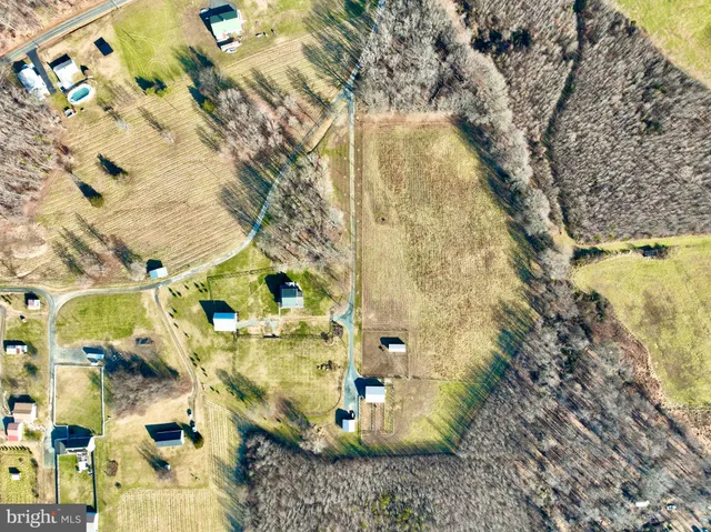 a bedroom with furniture and windows