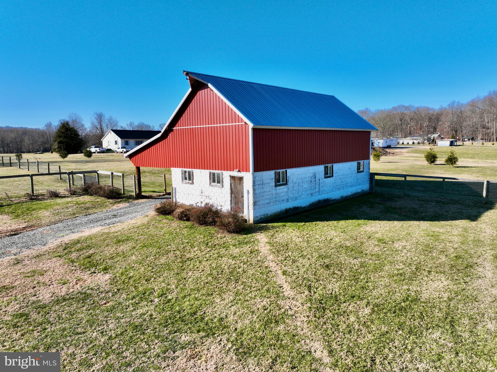 240 Randalia Road Chesapeake City, MD 21915 - Photo 3 of 23 a front view of a house with a yard