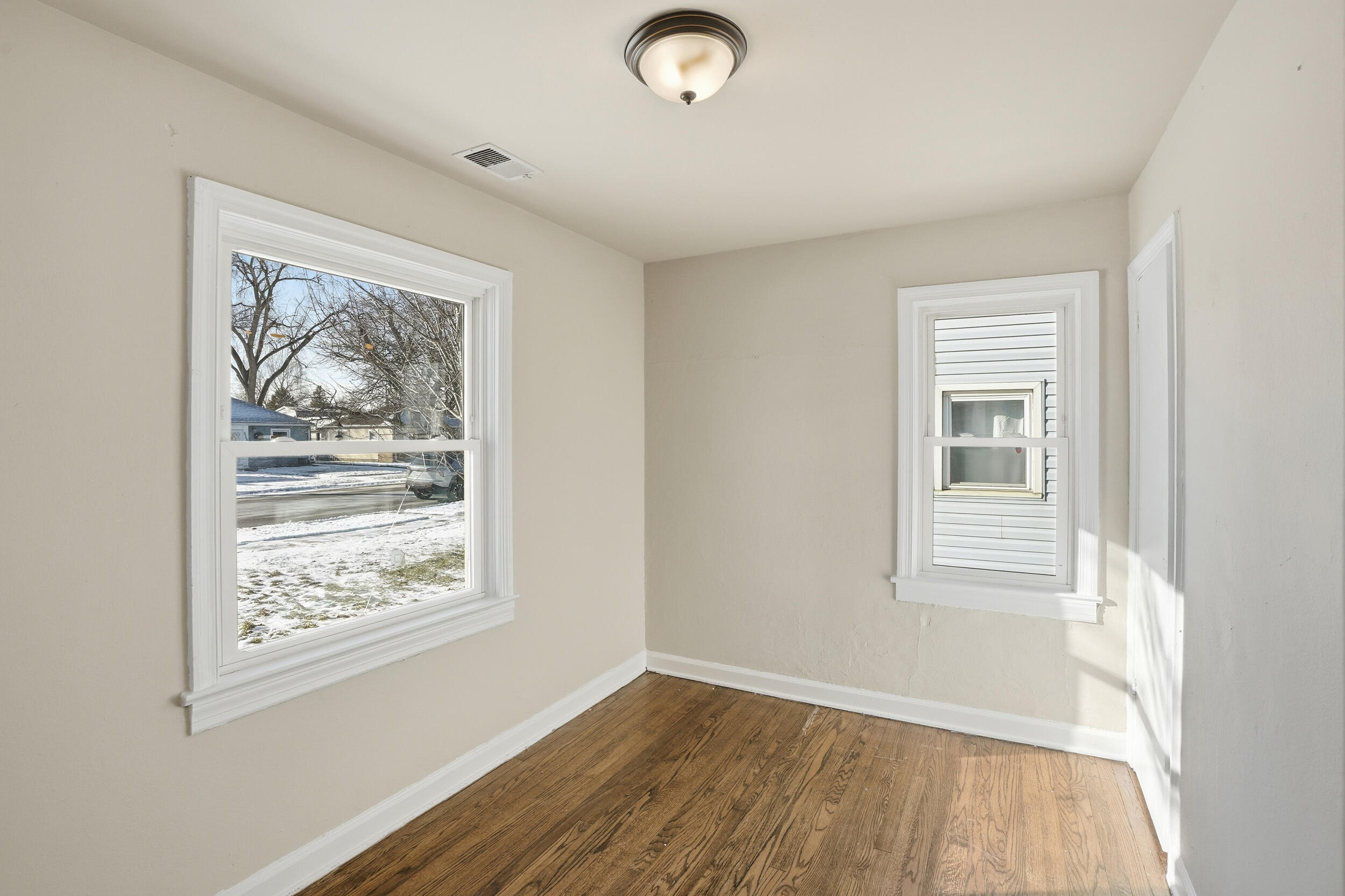 2731 Strong Street Highland, IN 46322 - Photo 11 of 16 a view of livingroom with window and wooden floor