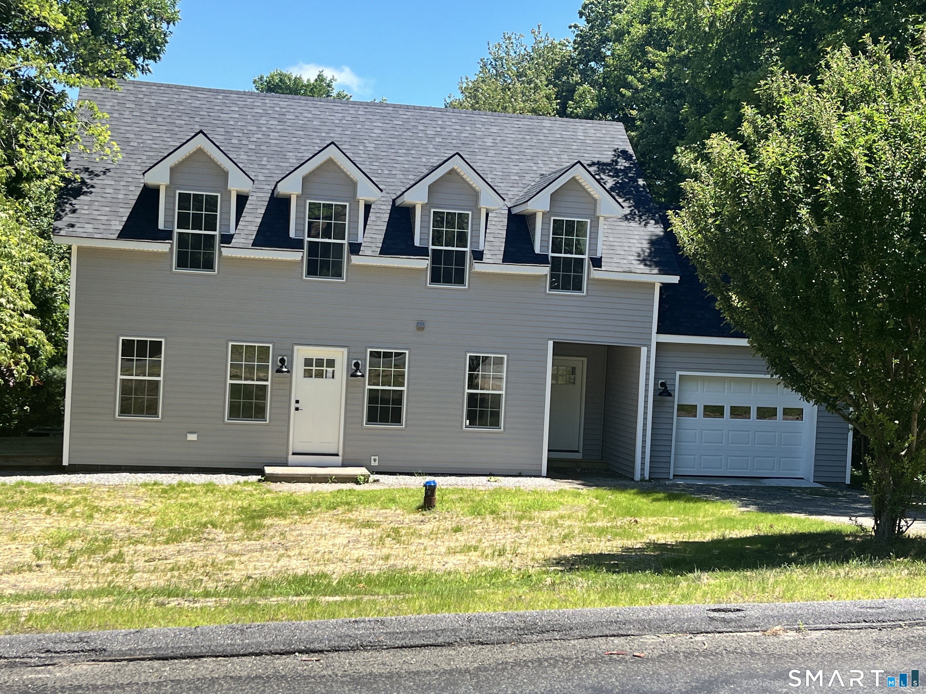 100 Wild Cat Hill Road Harwinton, CT 06791 - Photo 1 of 37 a view of a house with a swimming pool