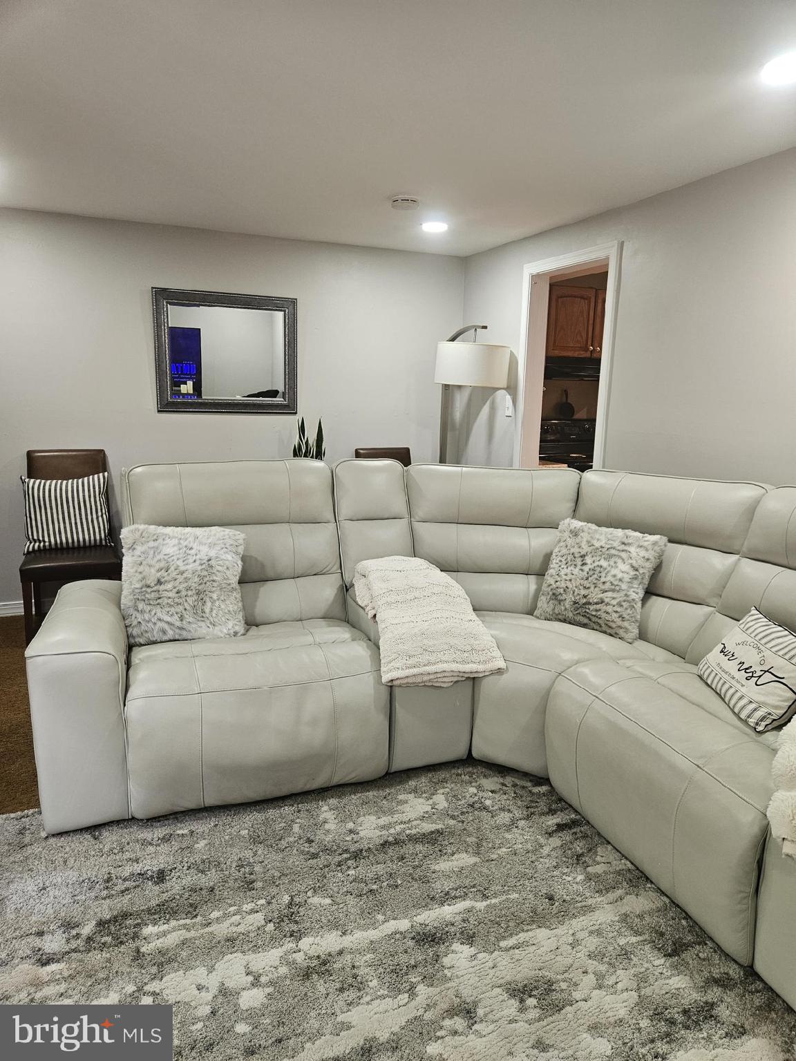 17607 Kohlhoss Road Poolesville, MD 20837 - Photo 26 of 29 a living room with furniture and a couch