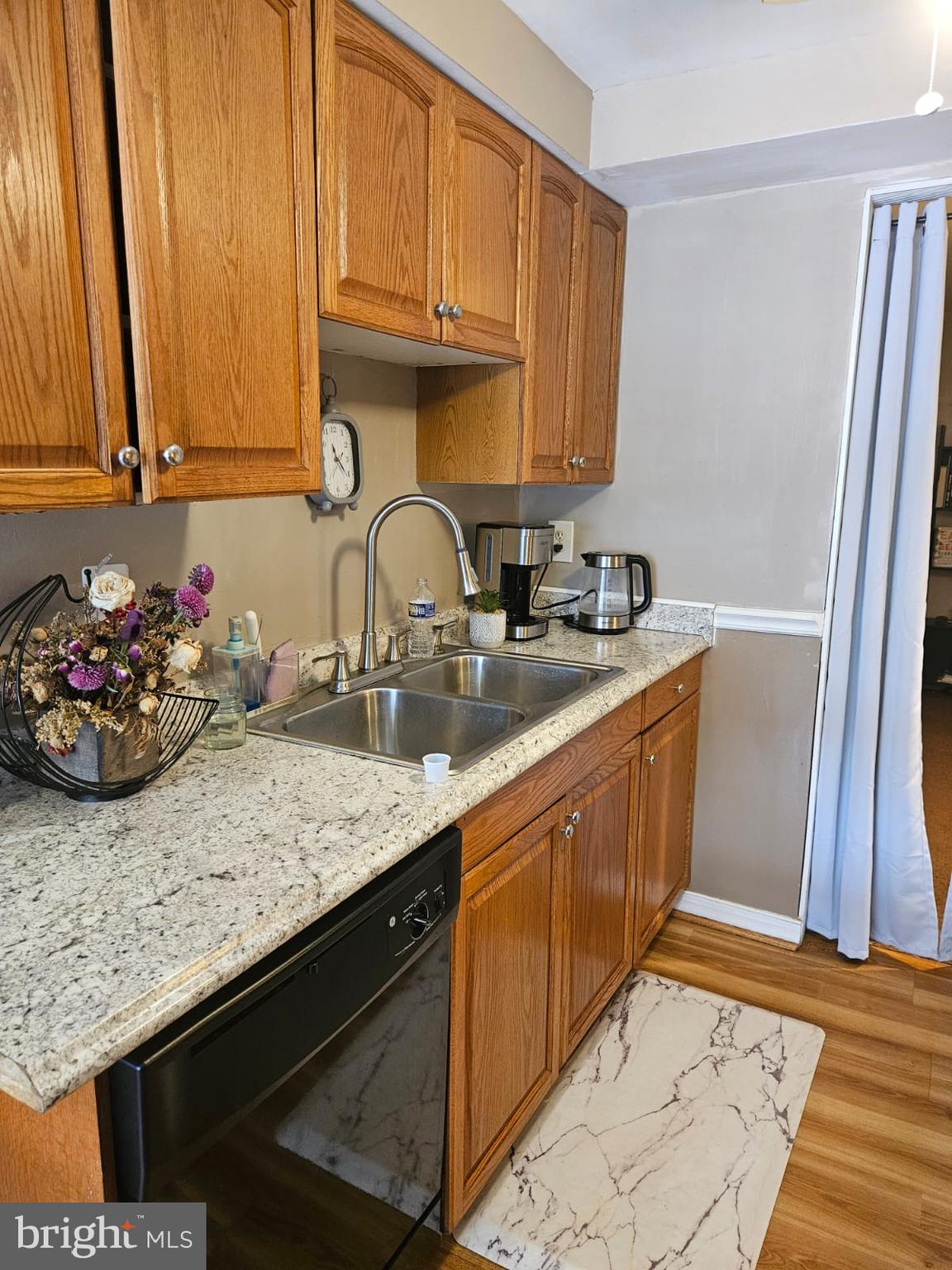 17607 Kohlhoss Road Poolesville, MD 20837 - Photo 9 of 29 a kitchen with sink cabinets and a window