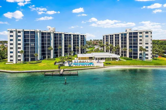 a view of a city with lawn chairs and a big yard