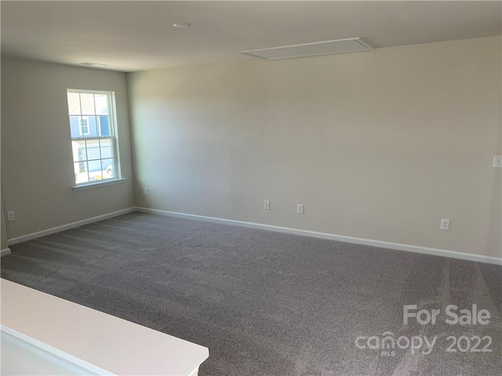6512 Gopher Road, Unit 320 Lancaster, SC 29720 - Photo 5 of 12 an empty room with windows