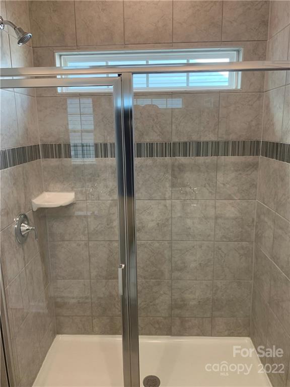 6512 Gopher Road, Unit 320 Lancaster, SC 29720 - Photo 6 of 12 a bathroom with a shower