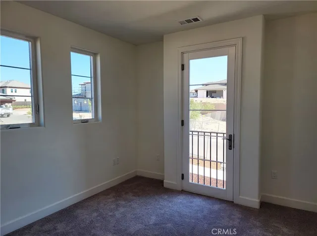 an empty room that has a window