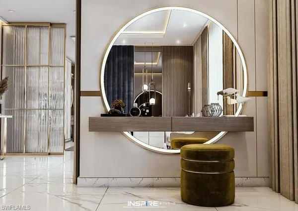 a bathroom with a tub a sink and mirror