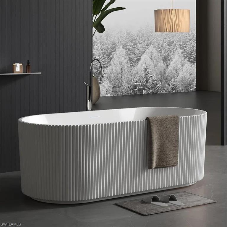 3898 Crayton Road Naples, FL 34103 - Photo 30 of 35 Photos are of a similar home by builder and are for illustrative purposes only. Optional fluted tub can be selected as part of your customized finishes.