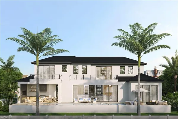 a view of a house with patio and a yard