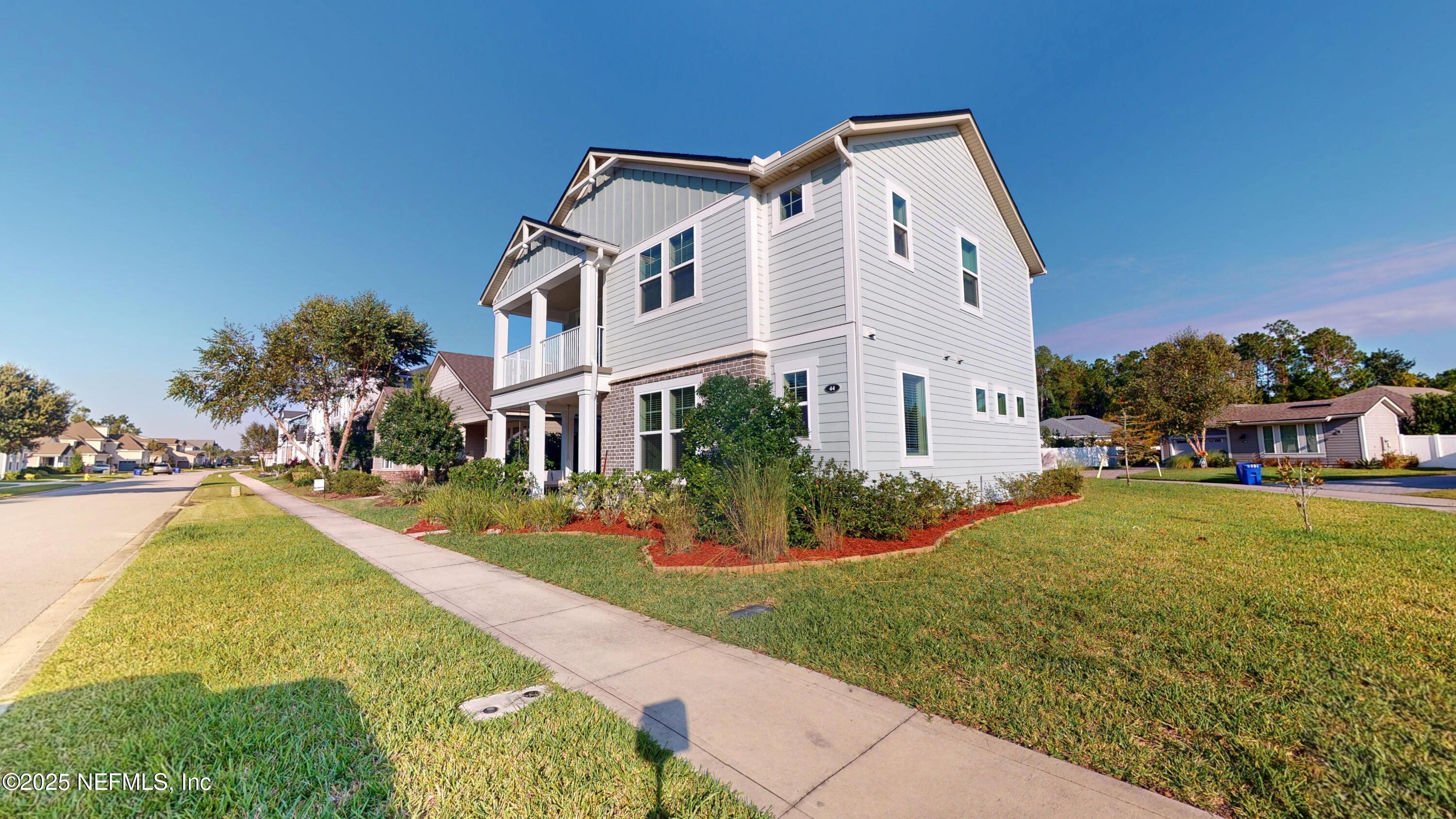44 Footbridge Road St. Johns, FL 32259 - Photo 2 of 45 a front view of a house with garden