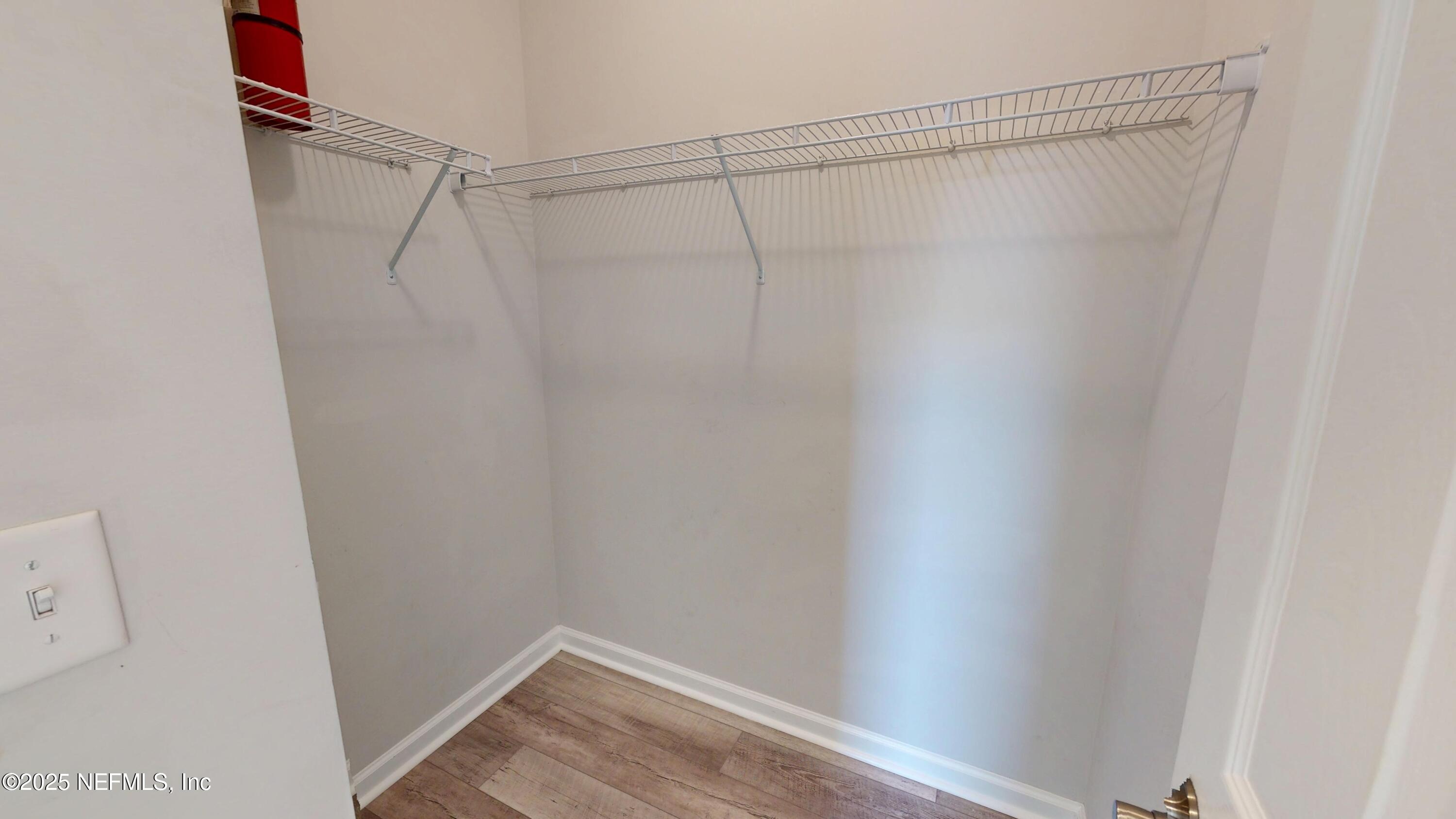 44 Footbridge Road St. Johns, FL 32259 - Photo 21 of 45 a view of a room with racks on the wall