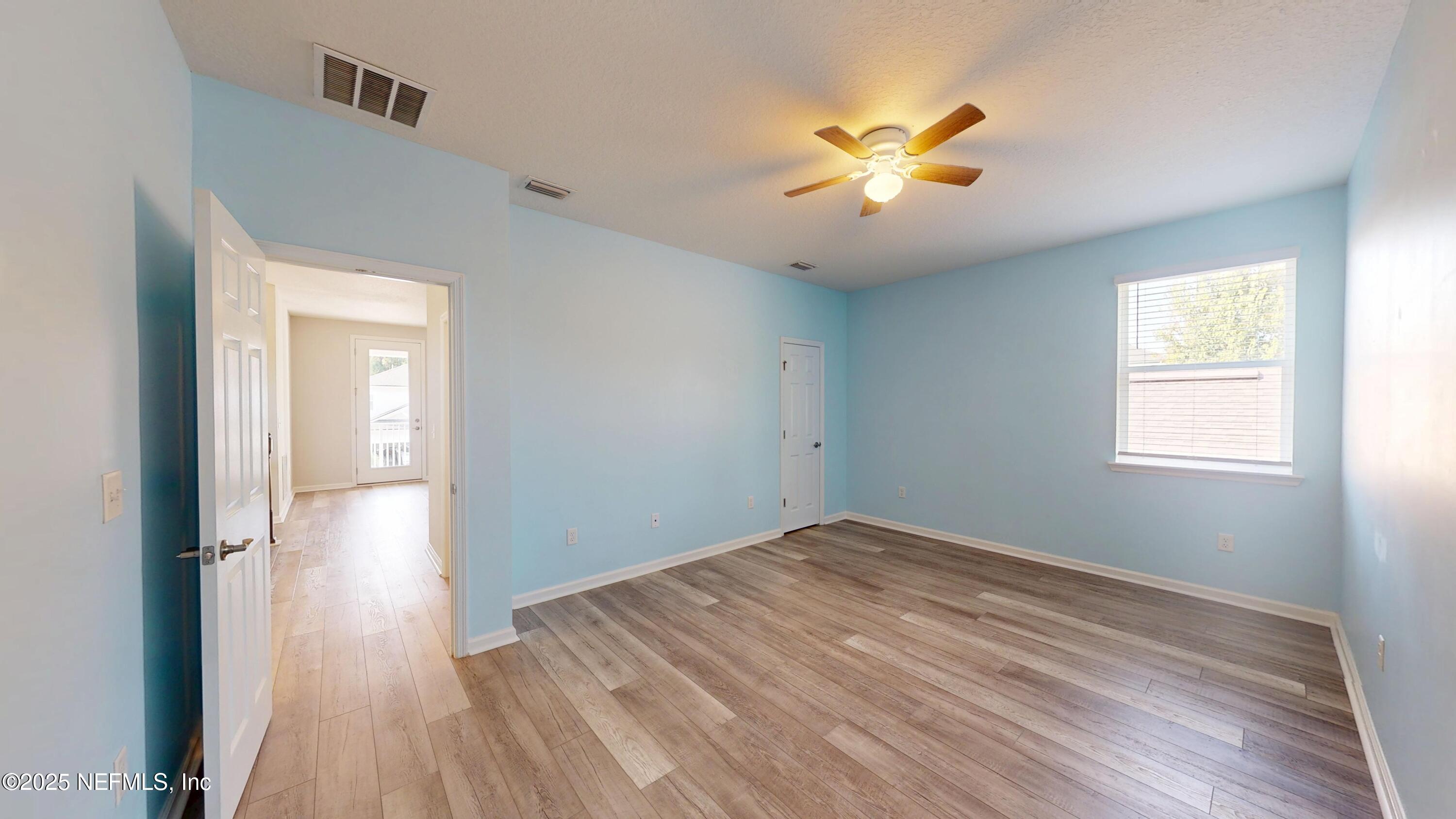 44 Footbridge Road St. Johns, FL 32259 - Photo 27 of 45 a view of a livingroom with a ceiling fan and window