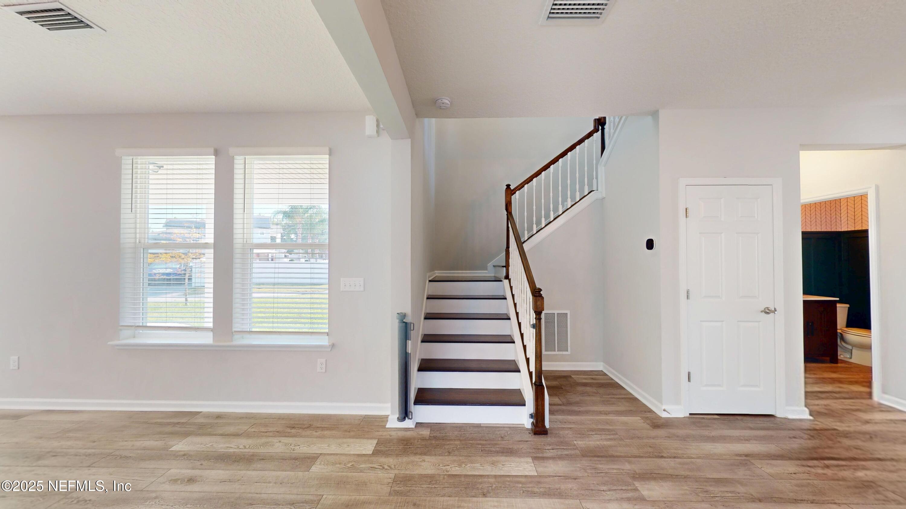 44 Footbridge Road St. Johns, FL 32259 - Photo 6 of 45 a view of entryway and hall with wooden floor