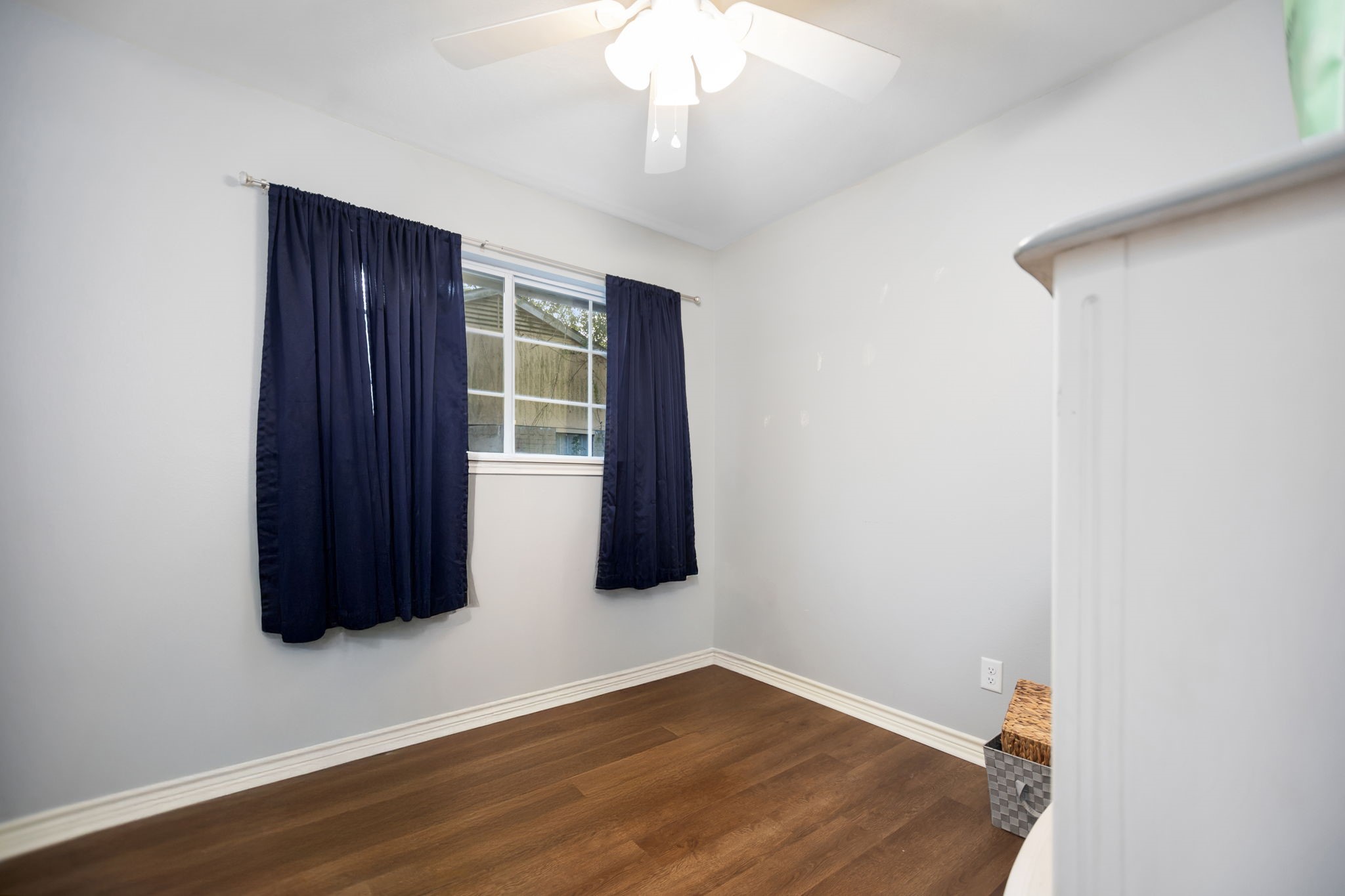 103 Quail Ridge Drive Nacogdoches, TX 75961 - Photo 15 of 28 an empty room with wooden floor and windows