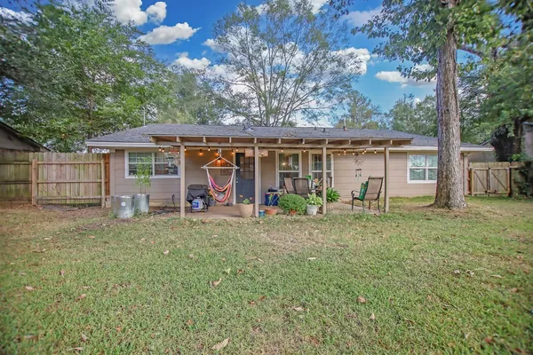 front view of a house with a big yard