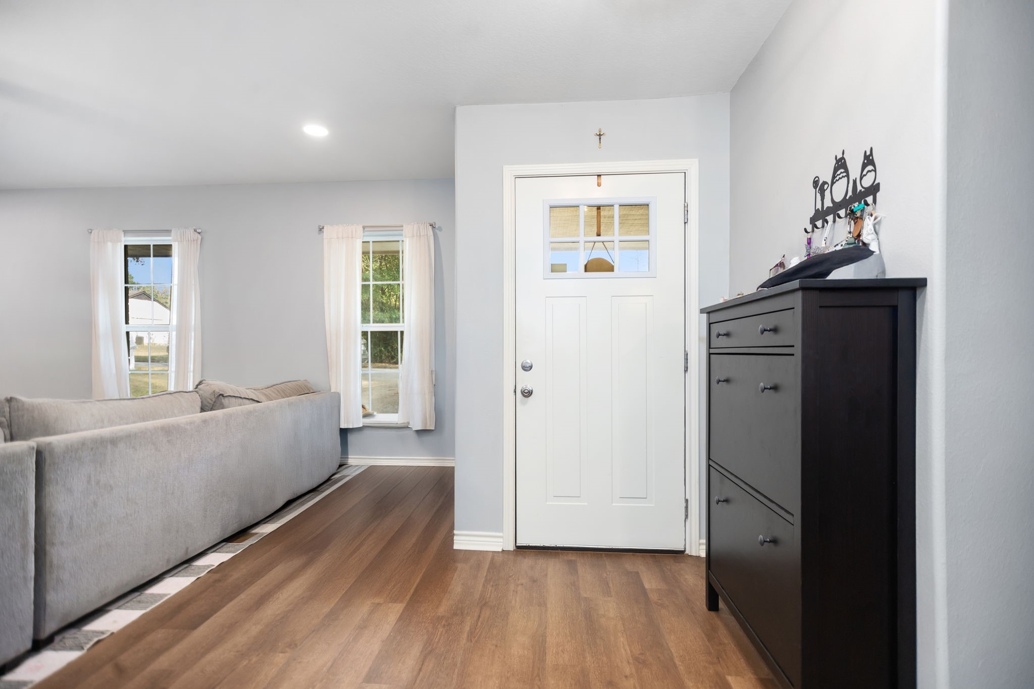 103 Quail Ridge Drive Nacogdoches, TX 75961 - Photo 3 of 28 a view of a bedroom with wooden floor and windows