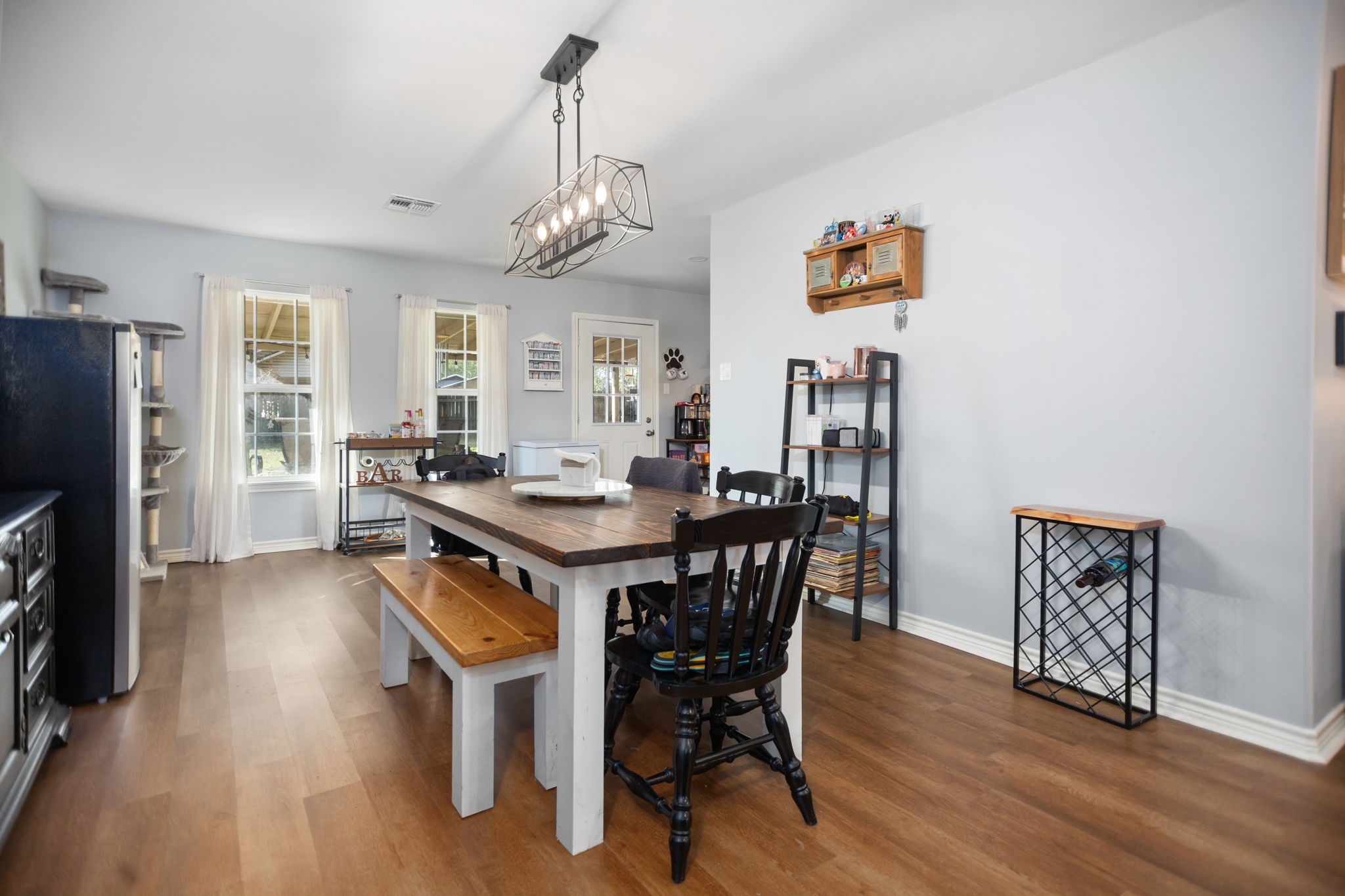 103 Quail Ridge Drive Nacogdoches, TX 75961 - Photo 10 of 28 a view of a dining room with furniture window and wooden floor