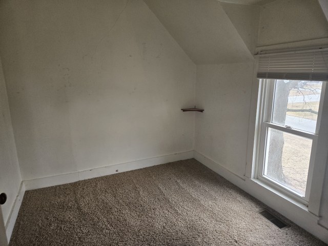 401 Northeast 3rd Street Aledo, IL 61231 - Photo 5 of 12 a view of room and window