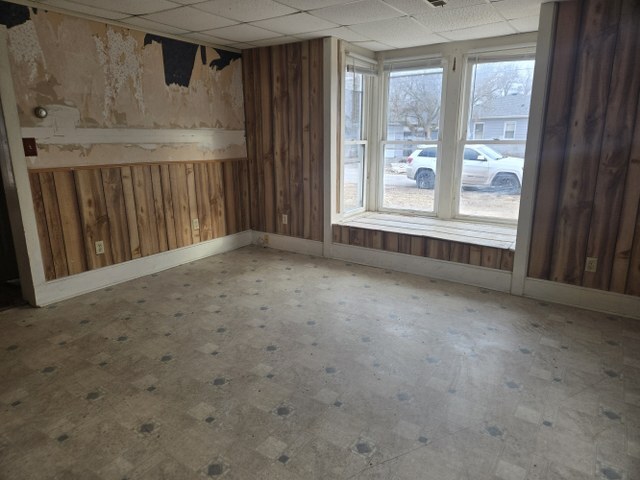 401 Northeast 3rd Street Aledo, IL 61231 - Photo 10 of 12 a view of a livingroom with an empty space and a window