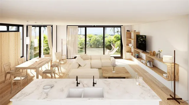 a living room with furniture and large windows