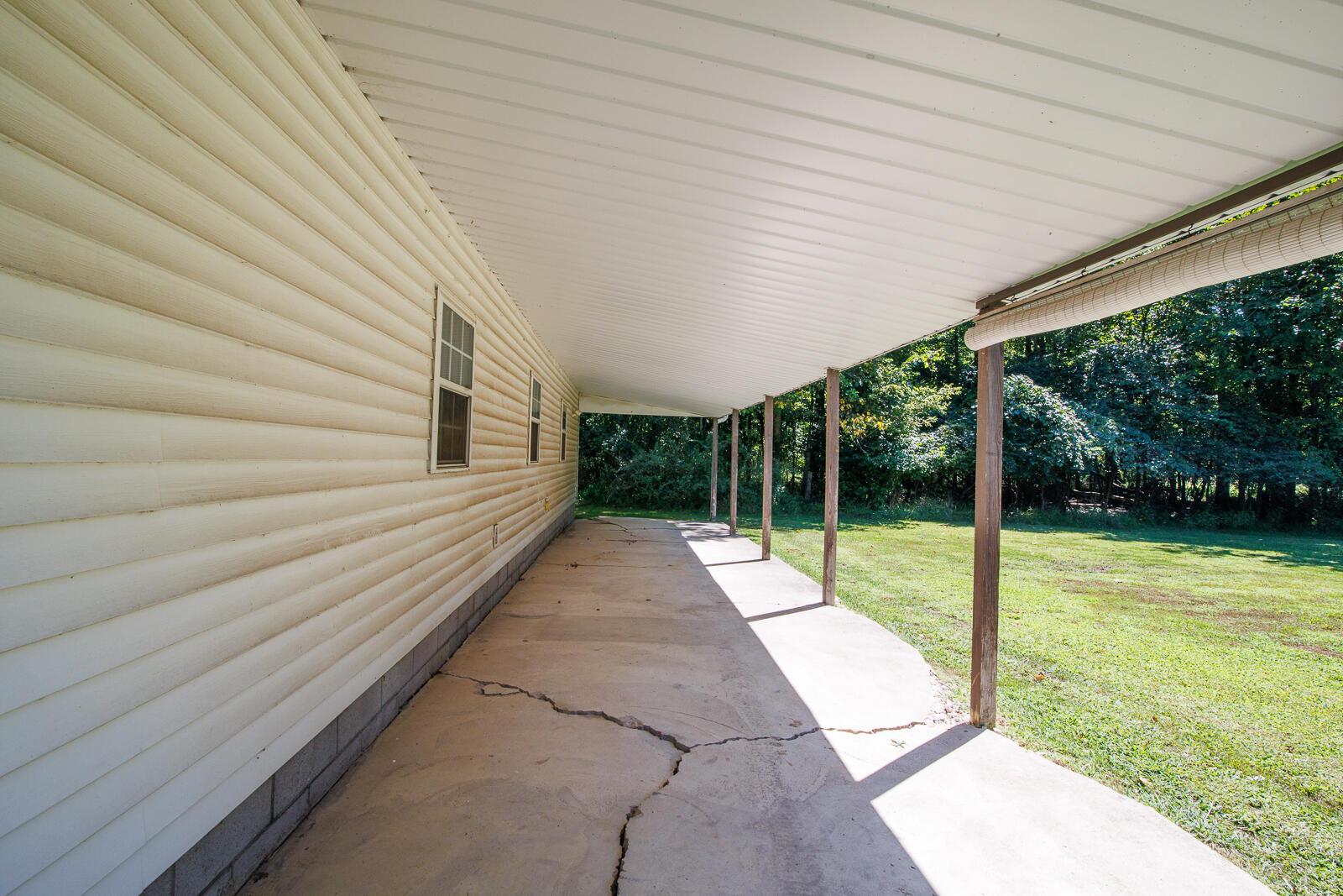 5881 Hughes Road Galena, OH 43021 - Photo 38 of 57 SIDE COVERED PORCH