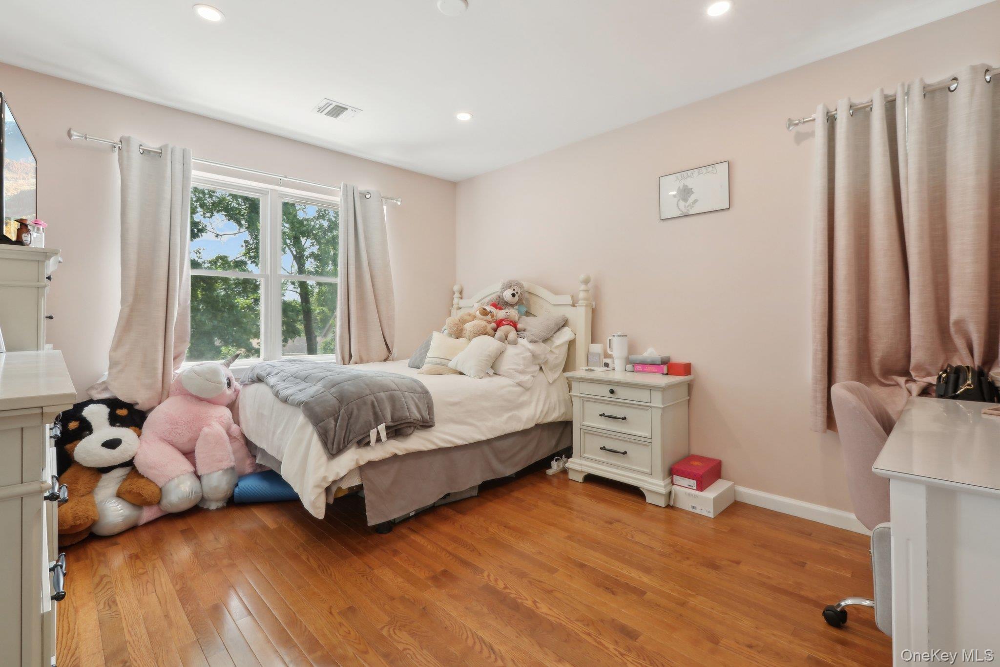 12-14 Lincoln Street Spring Valley, NY 10977 - Photo 12 of 33 Bedroom featuring light wood-style flooring, recessed lighting, and baseboards