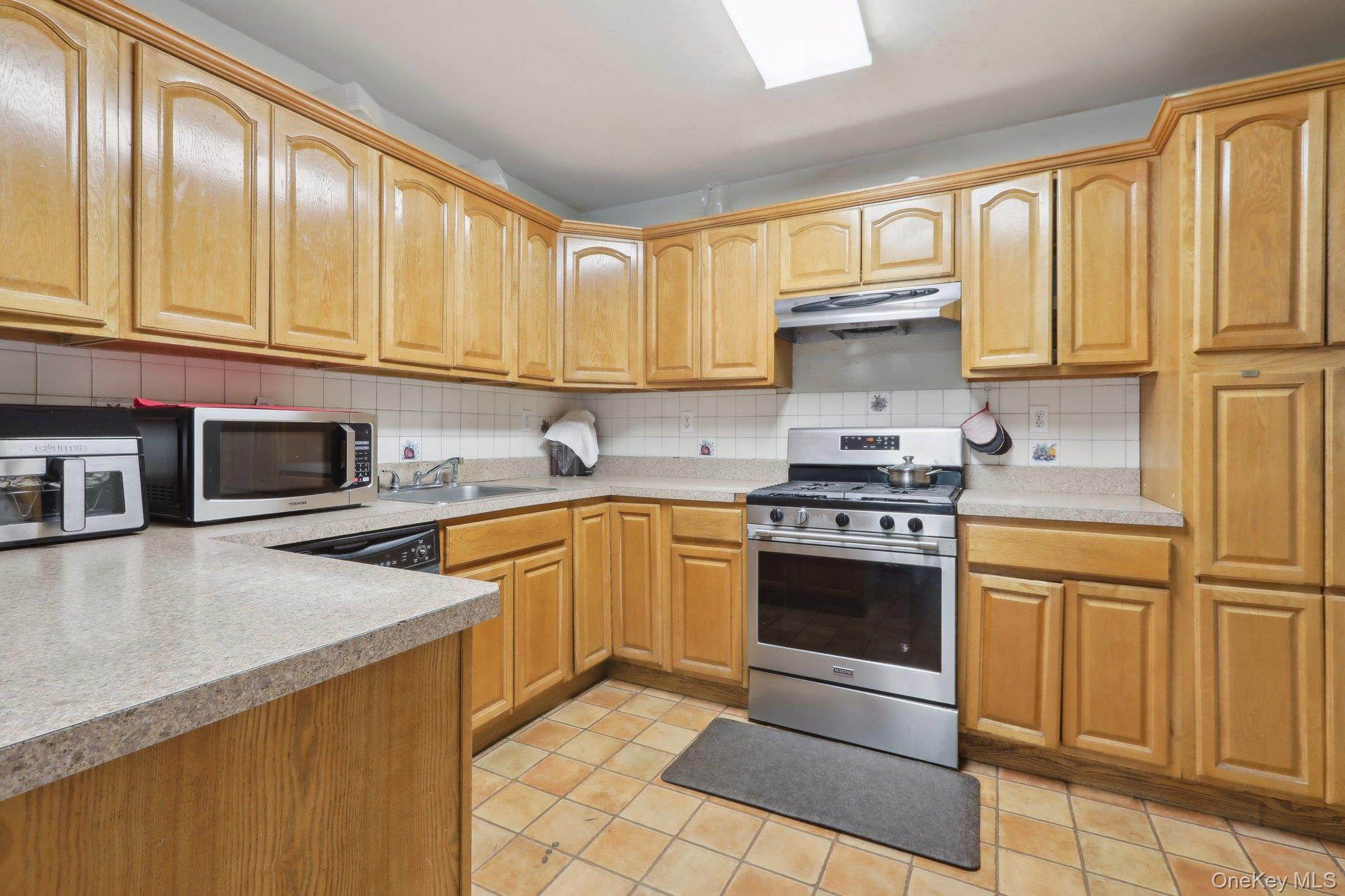 12-14 Lincoln Street Spring Valley, NY 10977 - Photo 17 of 33 Unit A, Level-2,Kitchen, featuring under cabinet range hood,