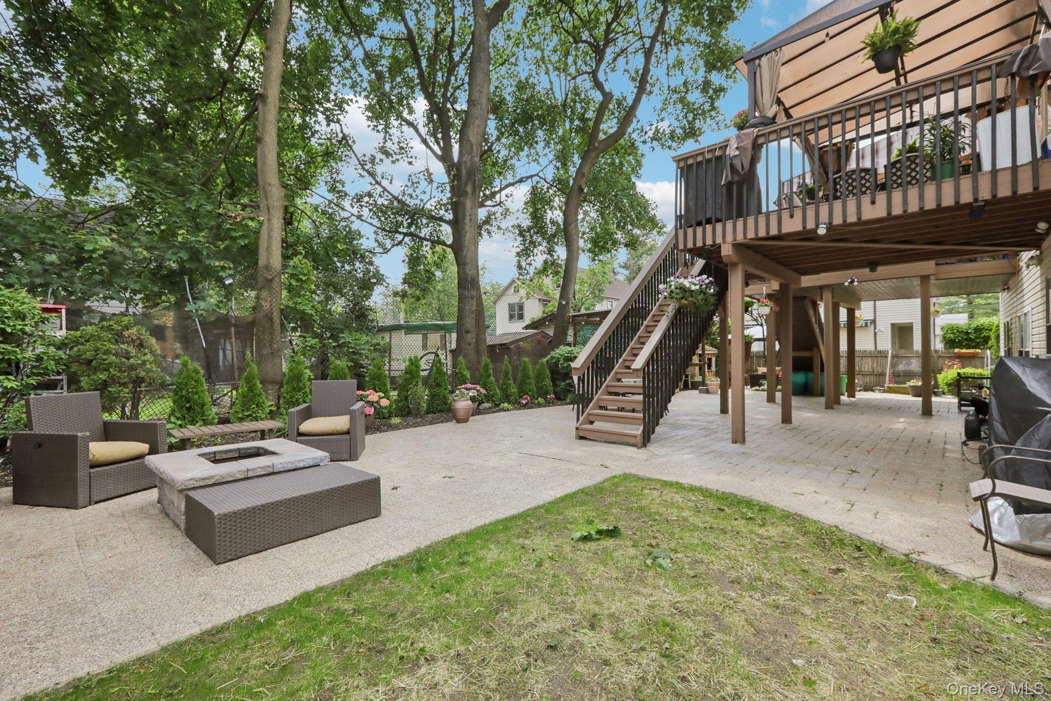 12-14 Lincoln Street Spring Valley, NY 10977 - Photo 23 of 33 View of patio featuring an outdoor fire pit and stairs
