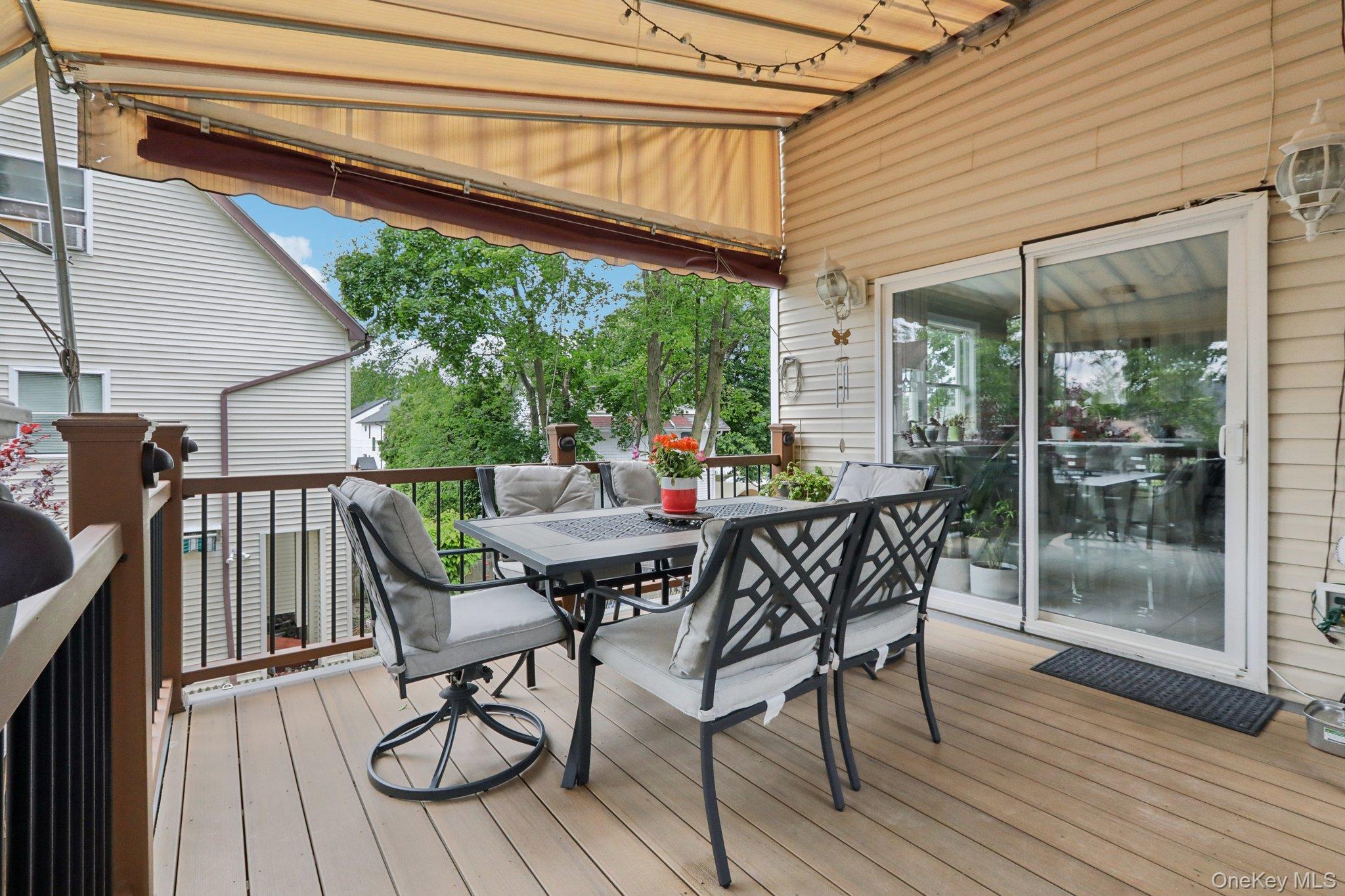12-14 Lincoln Street Spring Valley, NY 10977 - Photo 25 of 33 Wooden deck featuring outdoor dining space