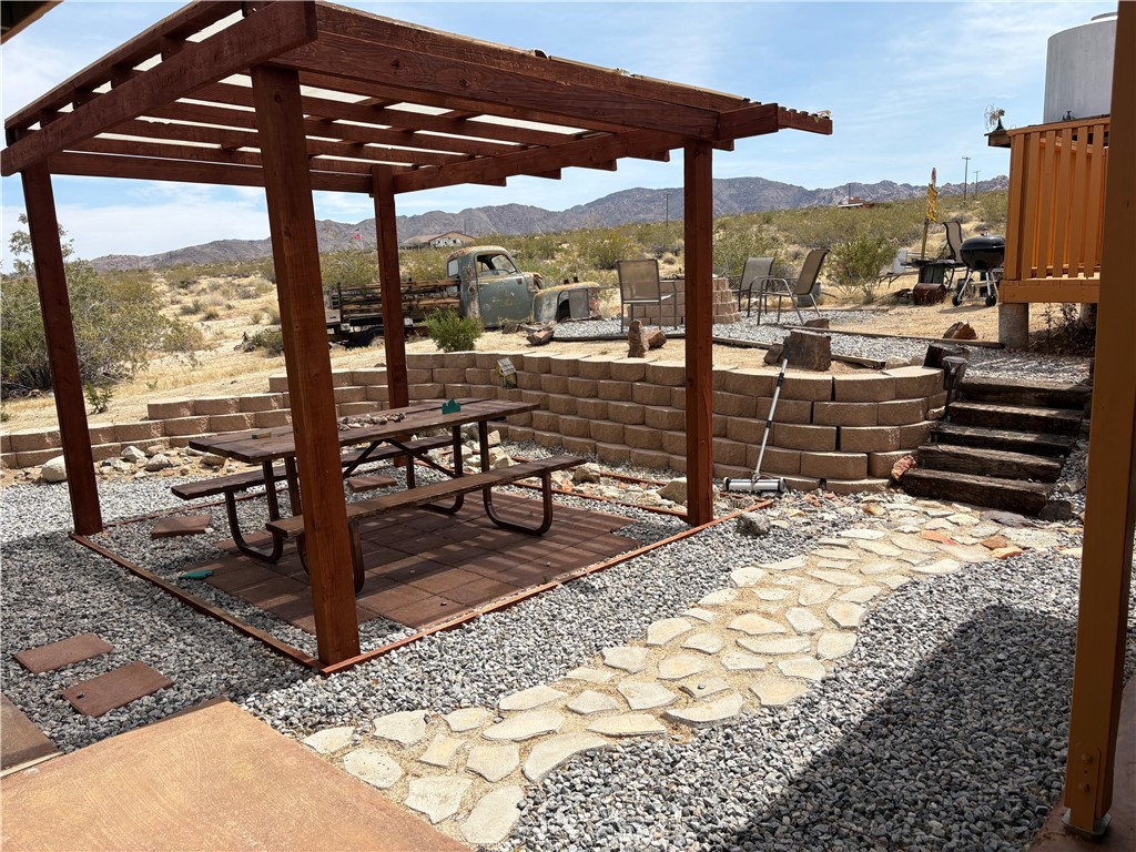 68033 Sullivan Road Twentynine Palms, CA 92277 - Photo 7 of 30 REAR PATIO DINE AREA