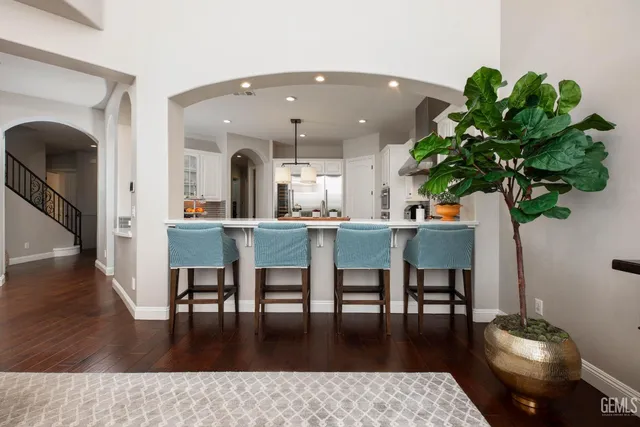 a bedroom with a bed and a fireplace