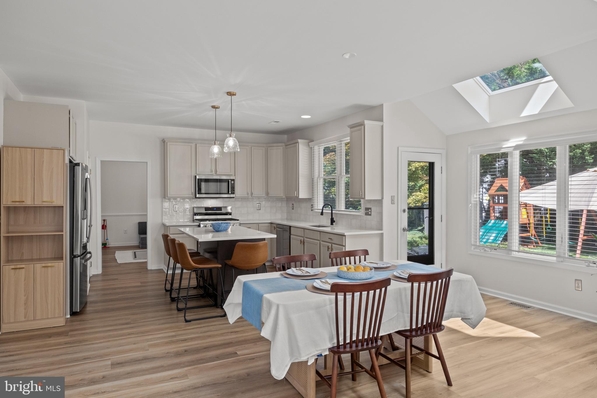 97 Brooks Road Moorestown, NJ 08057 - Photo 16 of 47 a large kitchen with a table and chairs