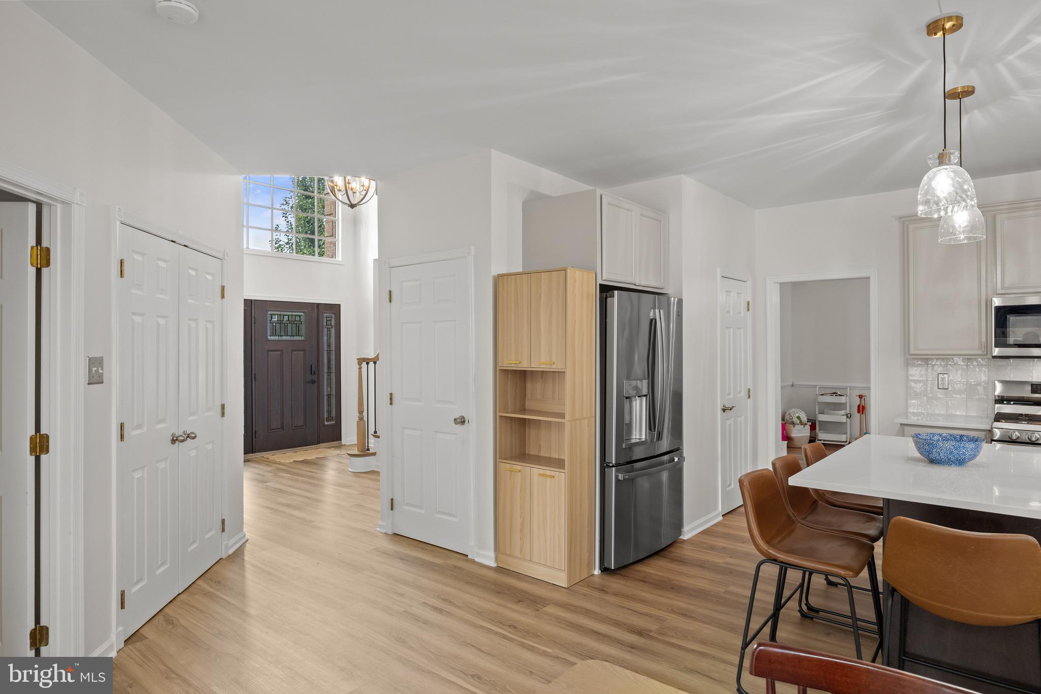97 Brooks Road Moorestown, NJ 08057 - Photo 17 of 47 a kitchen with stainless steel appliances a refrigerator and wooden floor