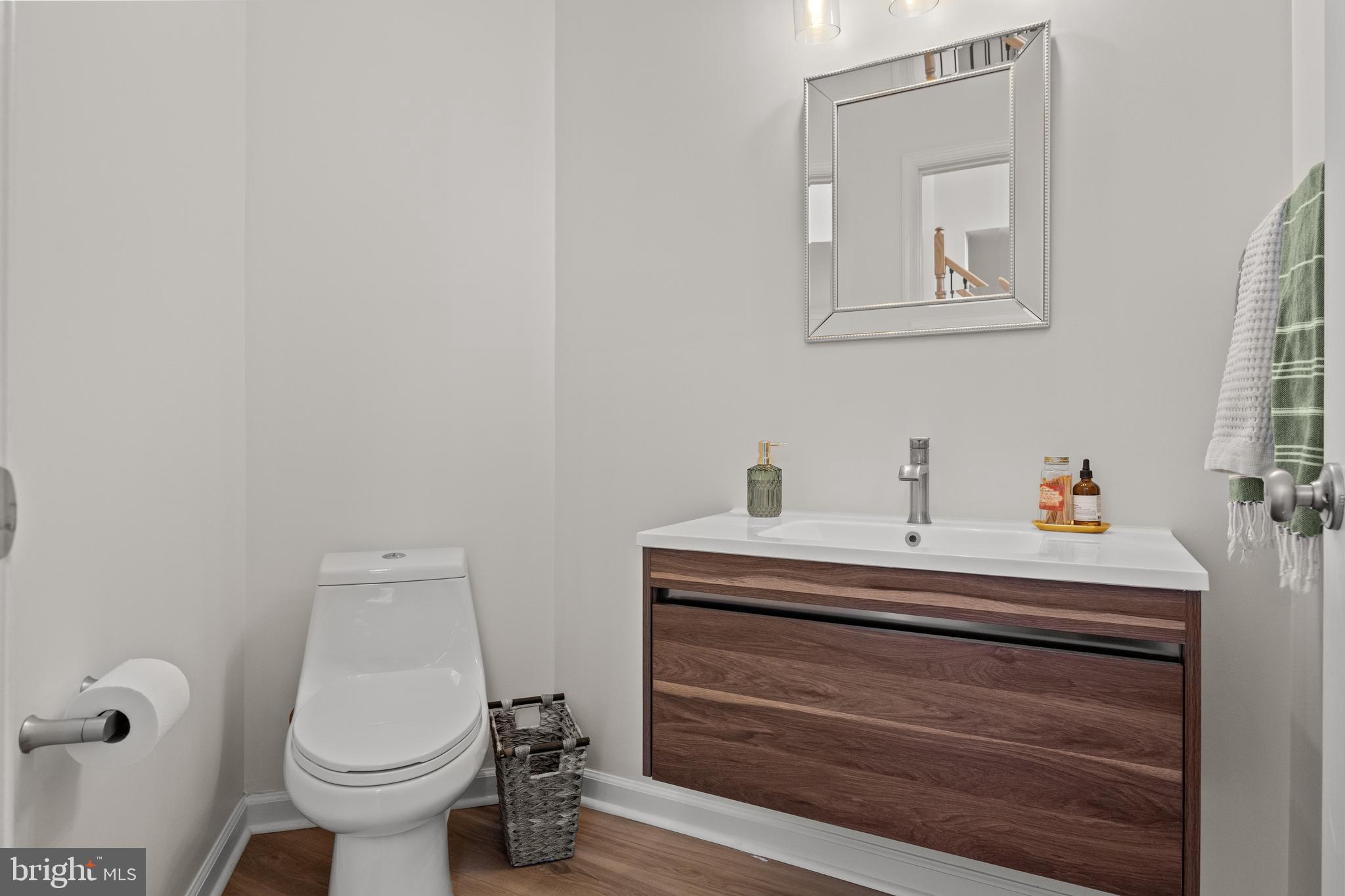 97 Brooks Road Moorestown, NJ 08057 - Photo 23 of 47 a bathroom with a toilet sink and mirror