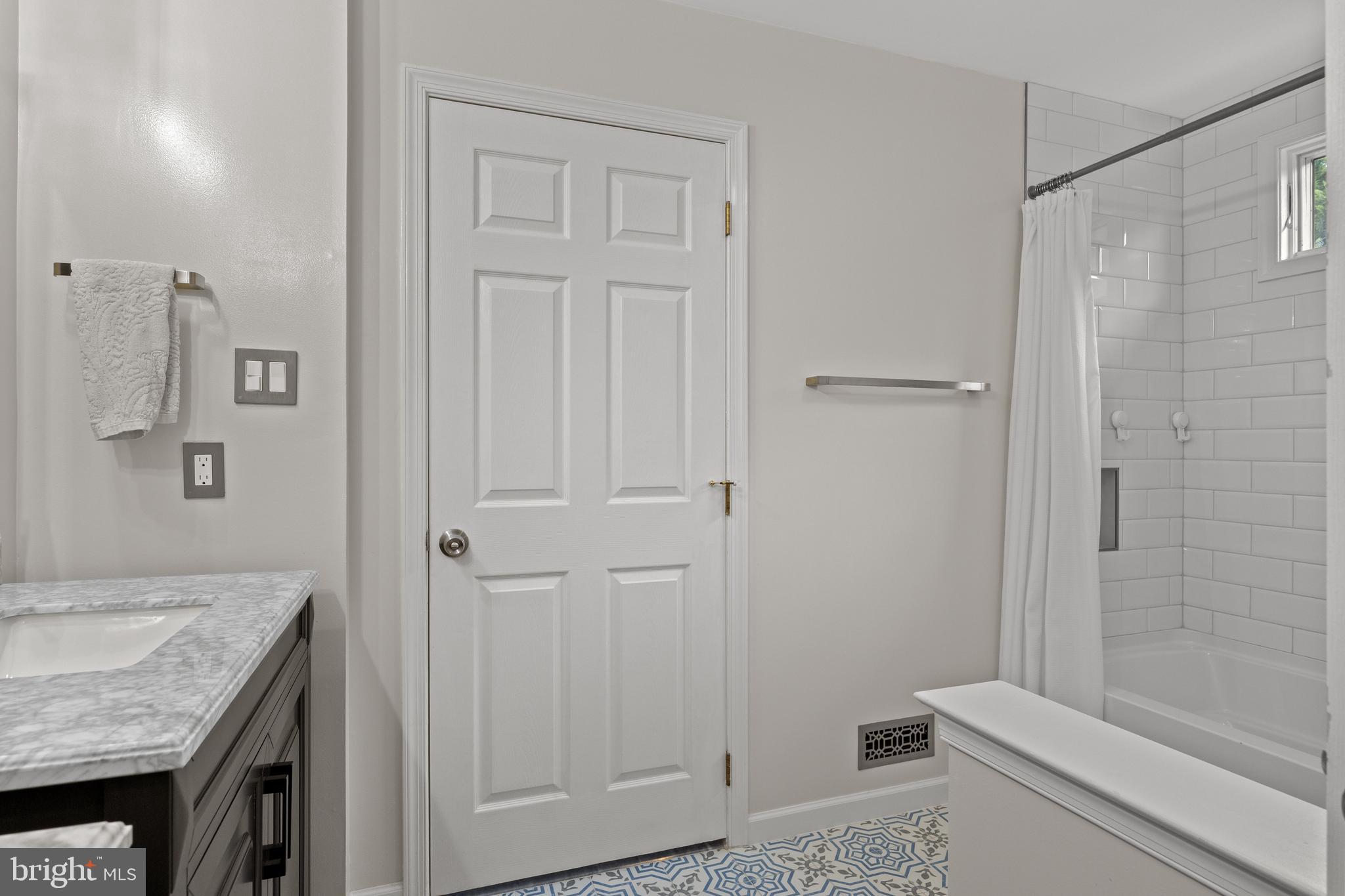 97 Brooks Road Moorestown, NJ 08057 - Photo 28 of 47 a bathroom with a granite countertop sink a toilet and shower