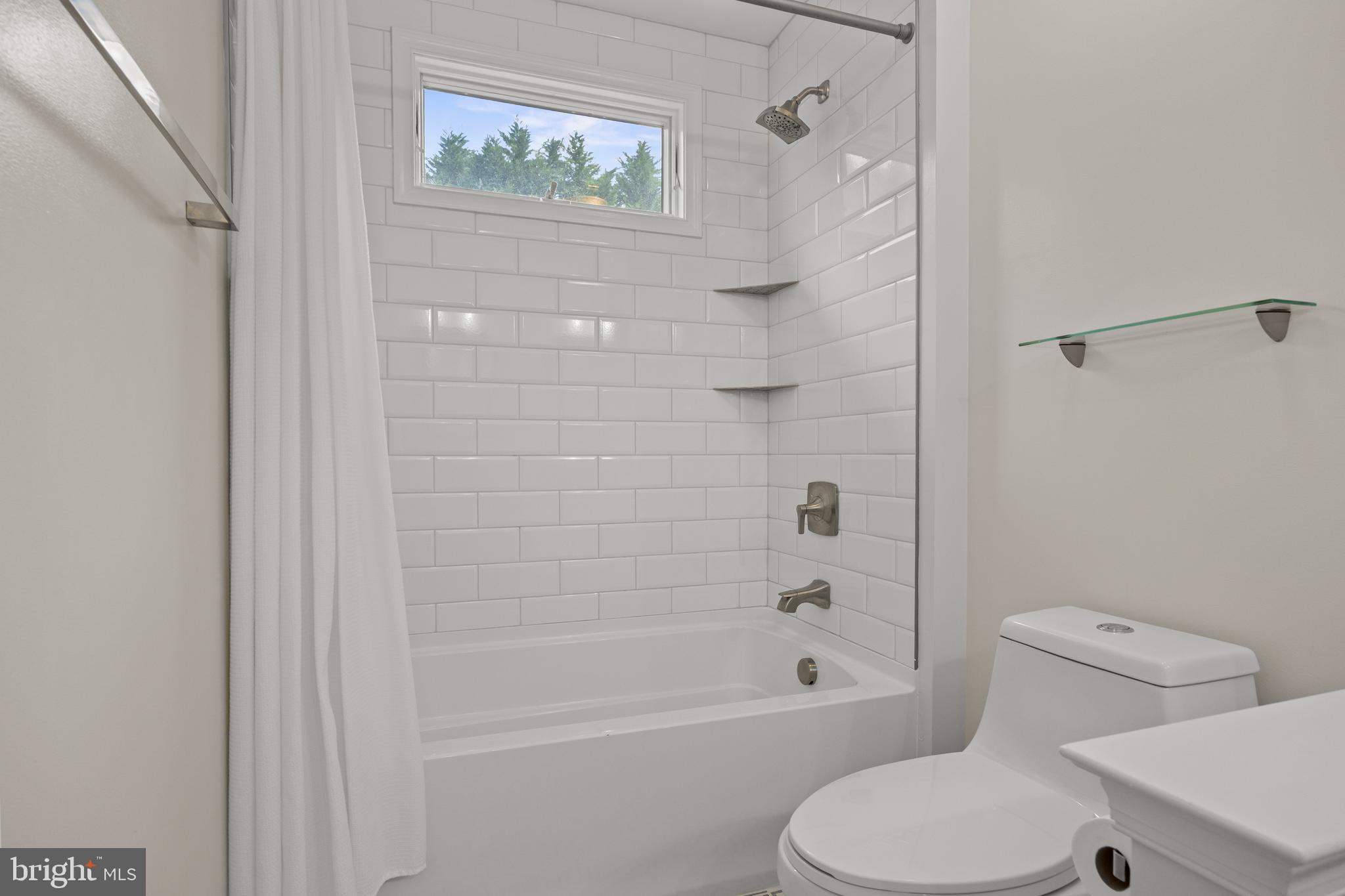 97 Brooks Road Moorestown, NJ 08057 - Photo 29 of 47 a white toilet sitting next to a bath tub