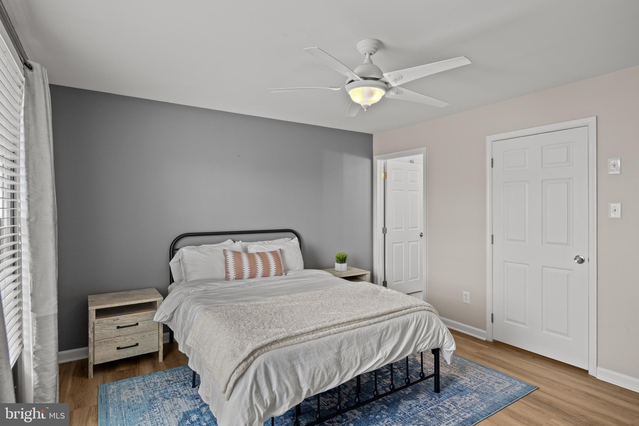 97 Brooks Road Moorestown, NJ 08057 - Photo 32 of 47 a bedroom with a bed and a chandelier