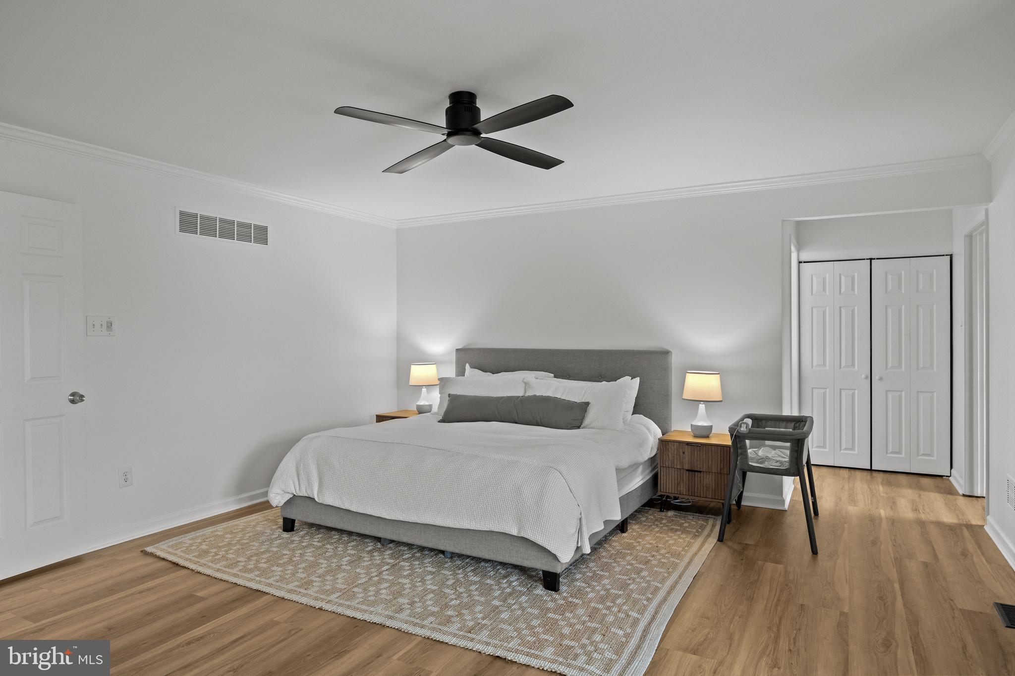 97 Brooks Road Moorestown, NJ 08057 - Photo 35 of 47 a bedroom with a bed and wooden floor