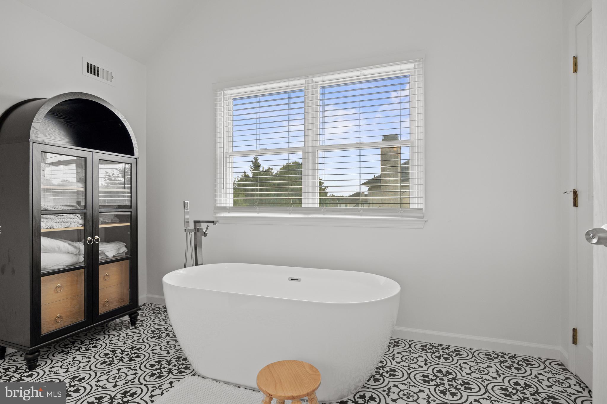 97 Brooks Road Moorestown, NJ 08057 - Photo 40 of 47 a bathroom with a toilet a sink and a window