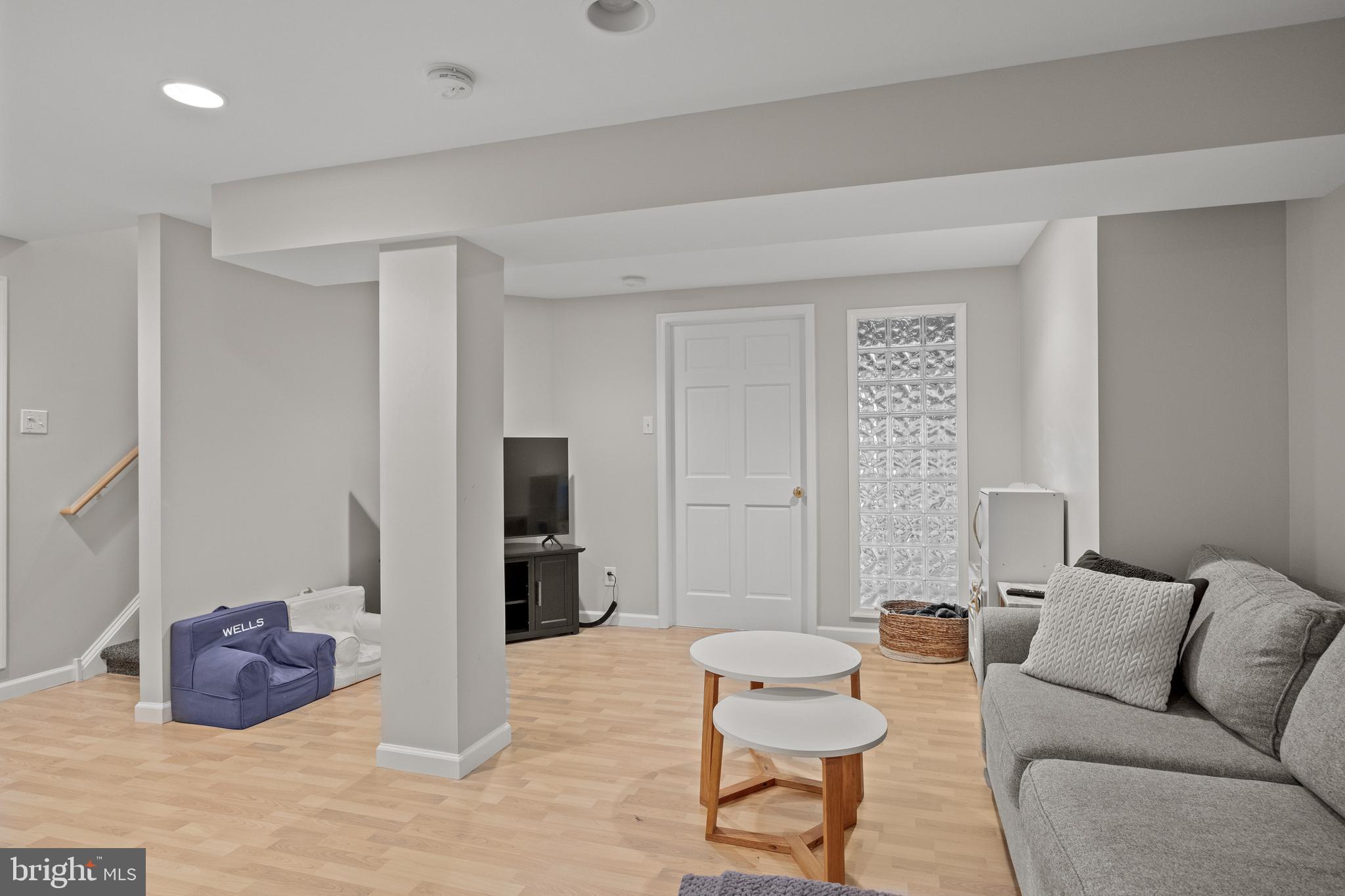 97 Brooks Road Moorestown, NJ 08057 - Photo 43 of 47 a living room with furniture and a rug