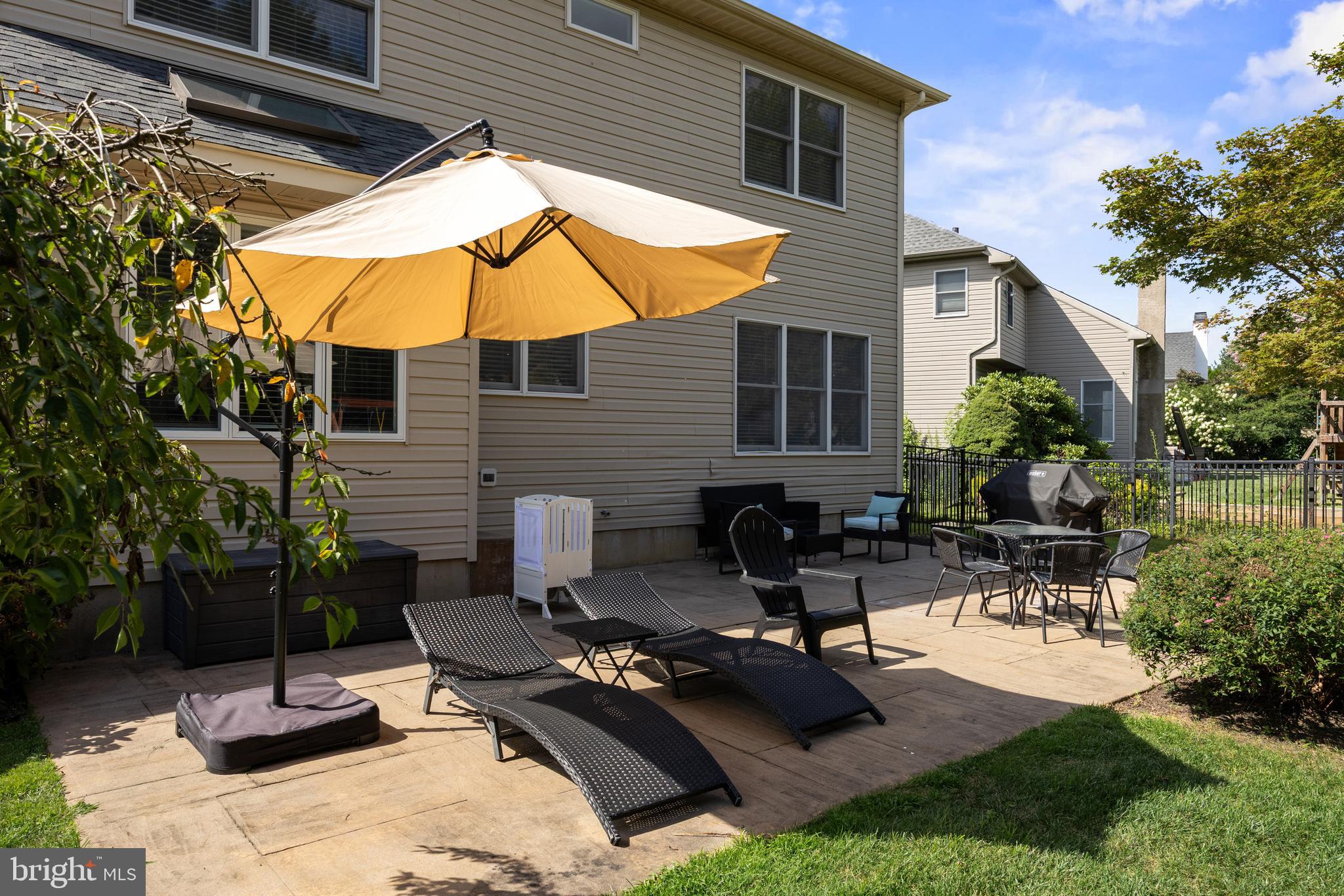97 Brooks Road Moorestown, NJ 08057 - Photo 45 of 47 a view of a backyard with sitting area