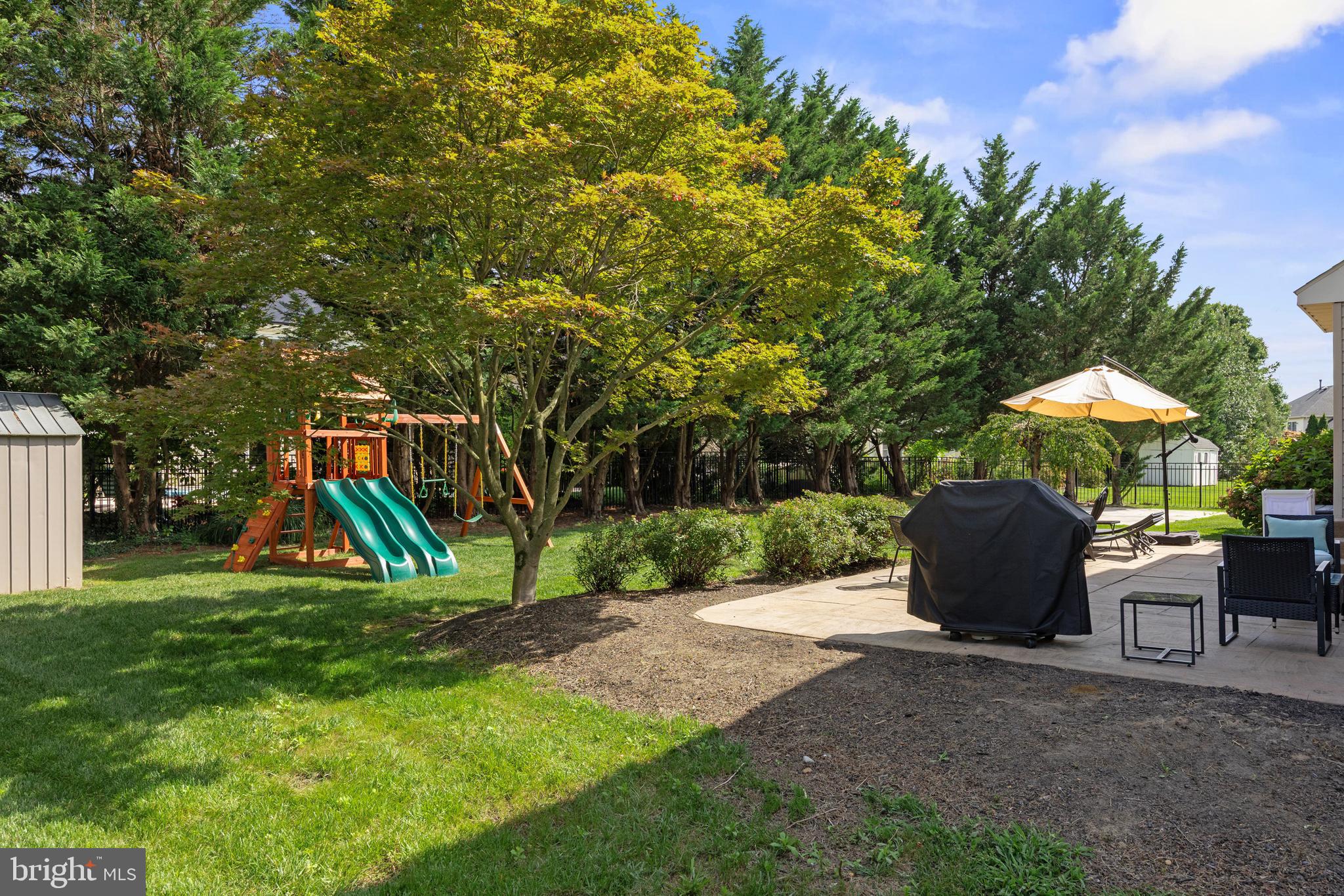 97 Brooks Road Moorestown, NJ 08057 - Photo 46 of 47 a view of a garden with a slide