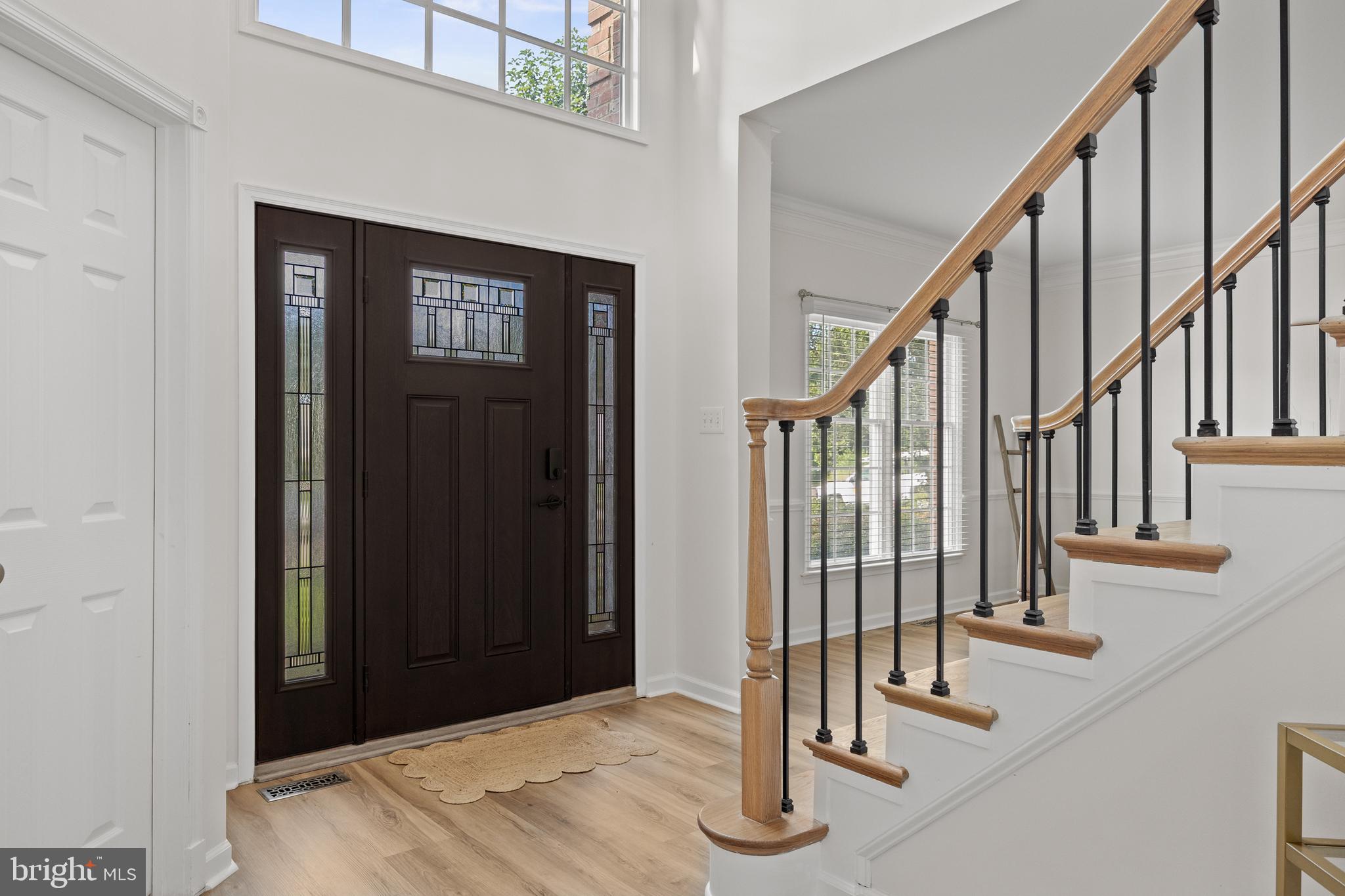 97 Brooks Road Moorestown, NJ 08057 - Photo 5 of 47 a view of staircase with railing and a chandelier